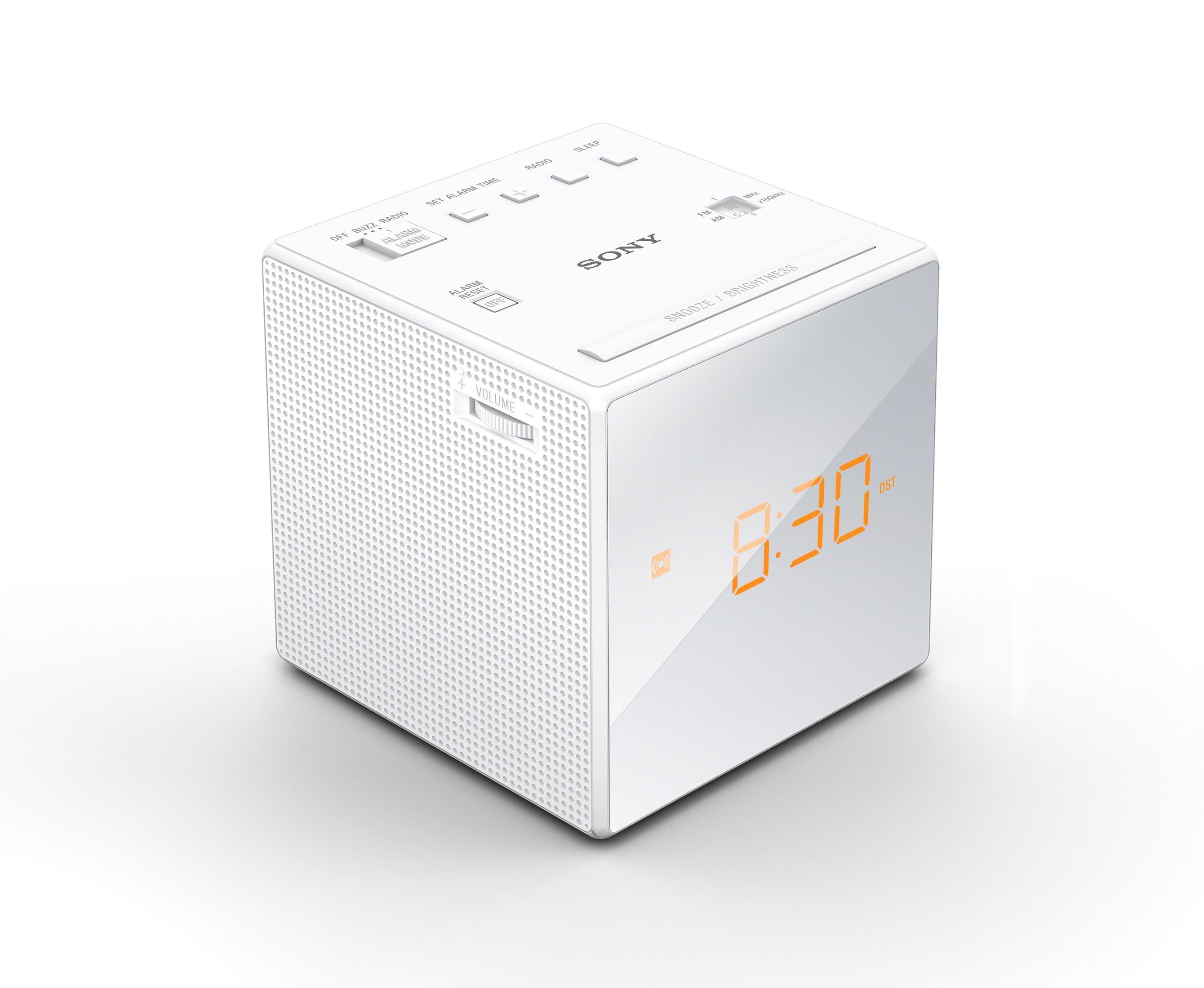 A white cube-shaped Sony clock radio with a digital display showing the time 9:30.