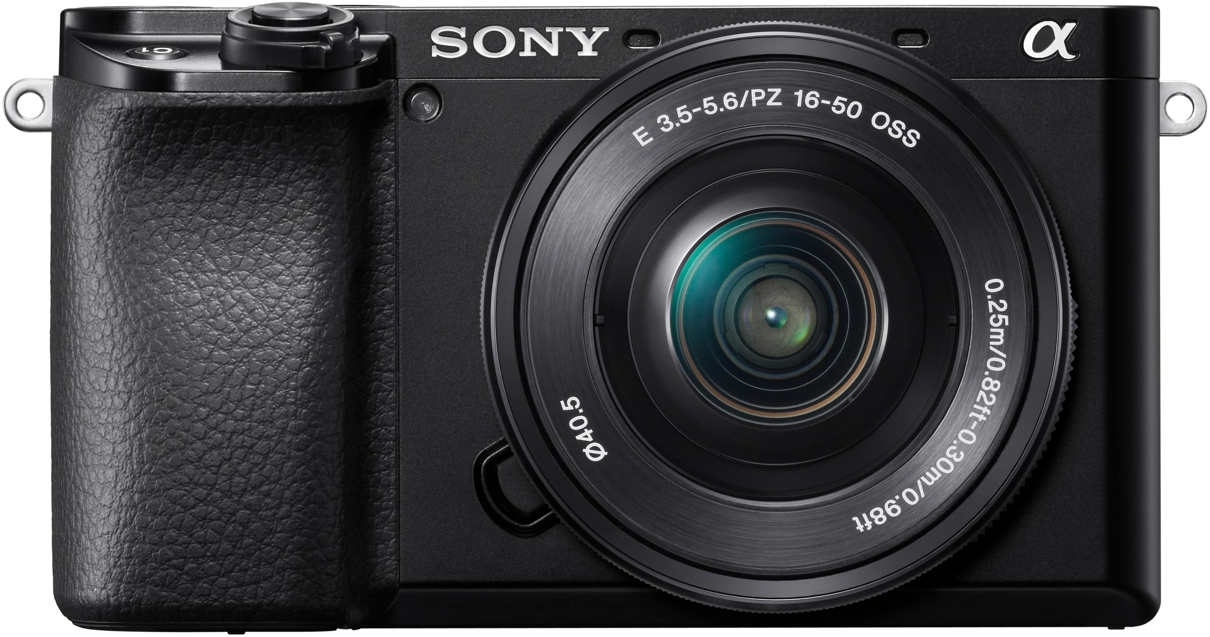 Cámara negra, lente centrada, logotipo Sony arriba. Marcas de lente visibles.