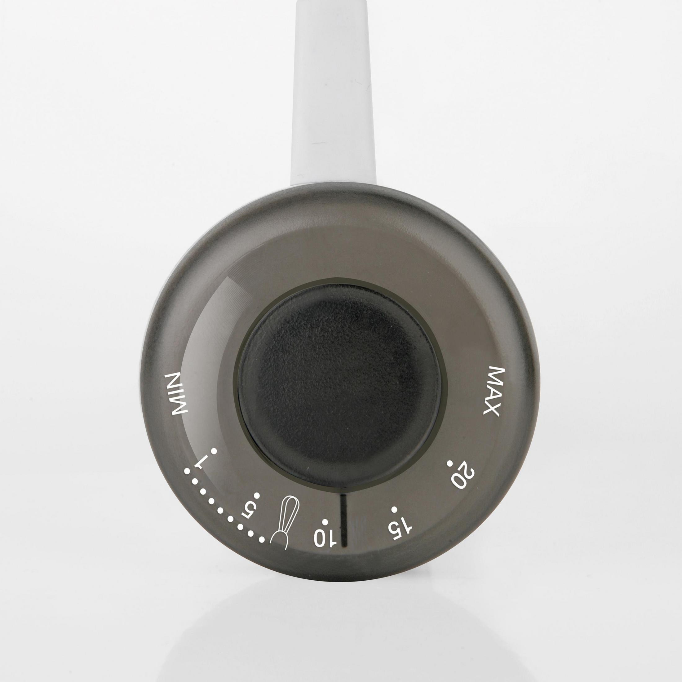 Zbliżenie czarnego pokrętła z białymi oznaczeniami, od MIN do MAX, na białym tle.