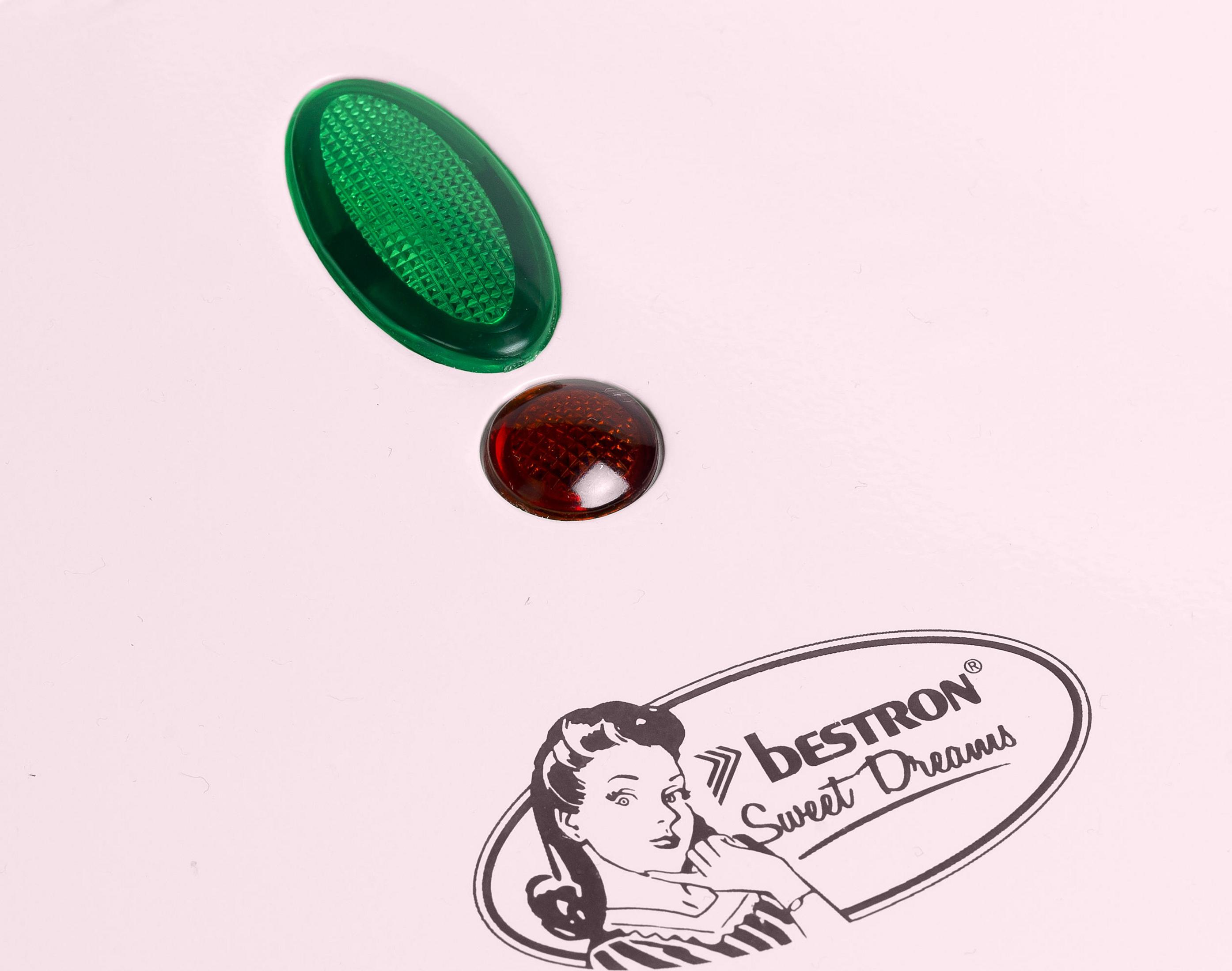 Zbliżenie białego urządzenia z dwoma światłami, zielonym i czerwonym, oraz logo Bestron.