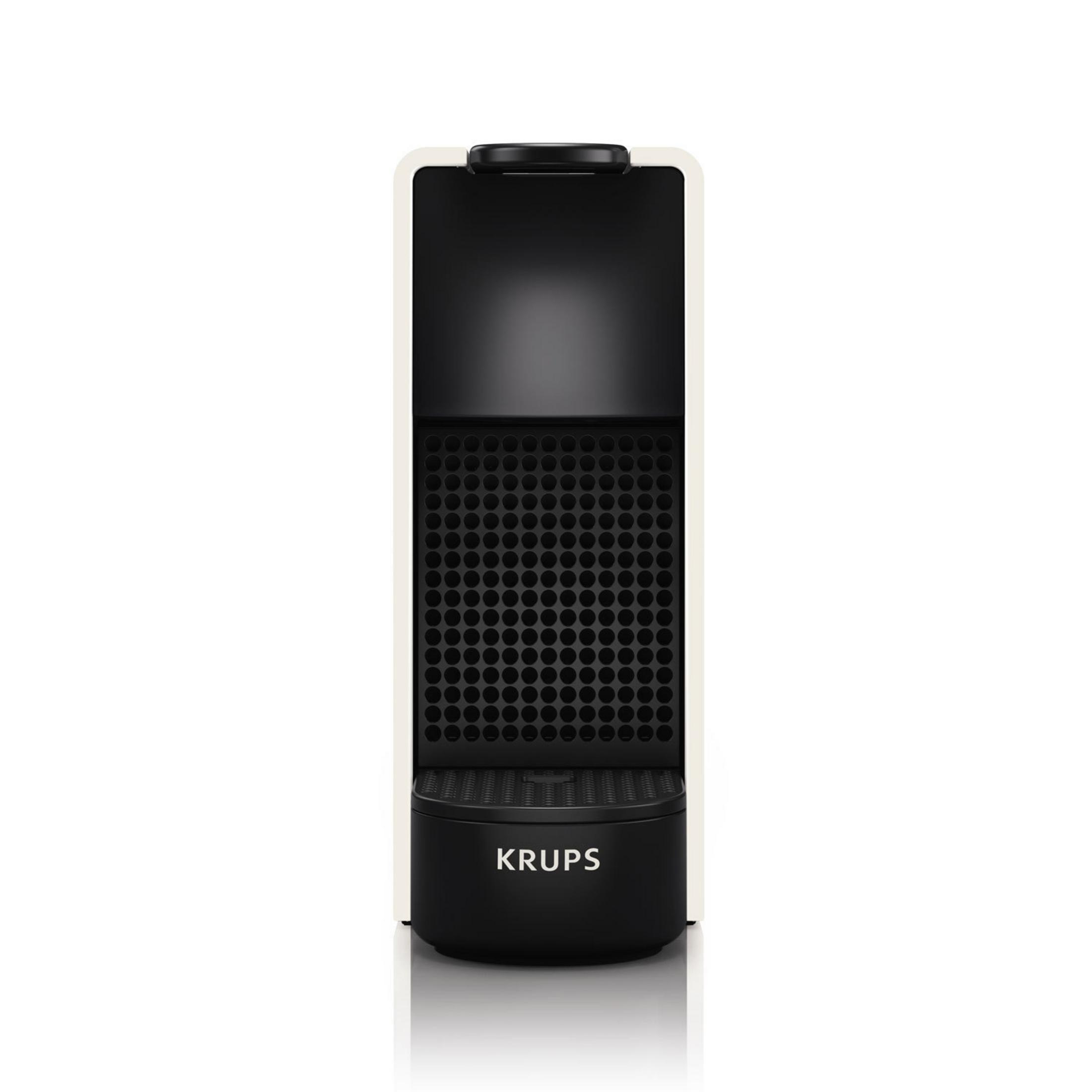 Biało-czarny ekspres do kawy Krups. Ma czarny przód z wieloma otworami.