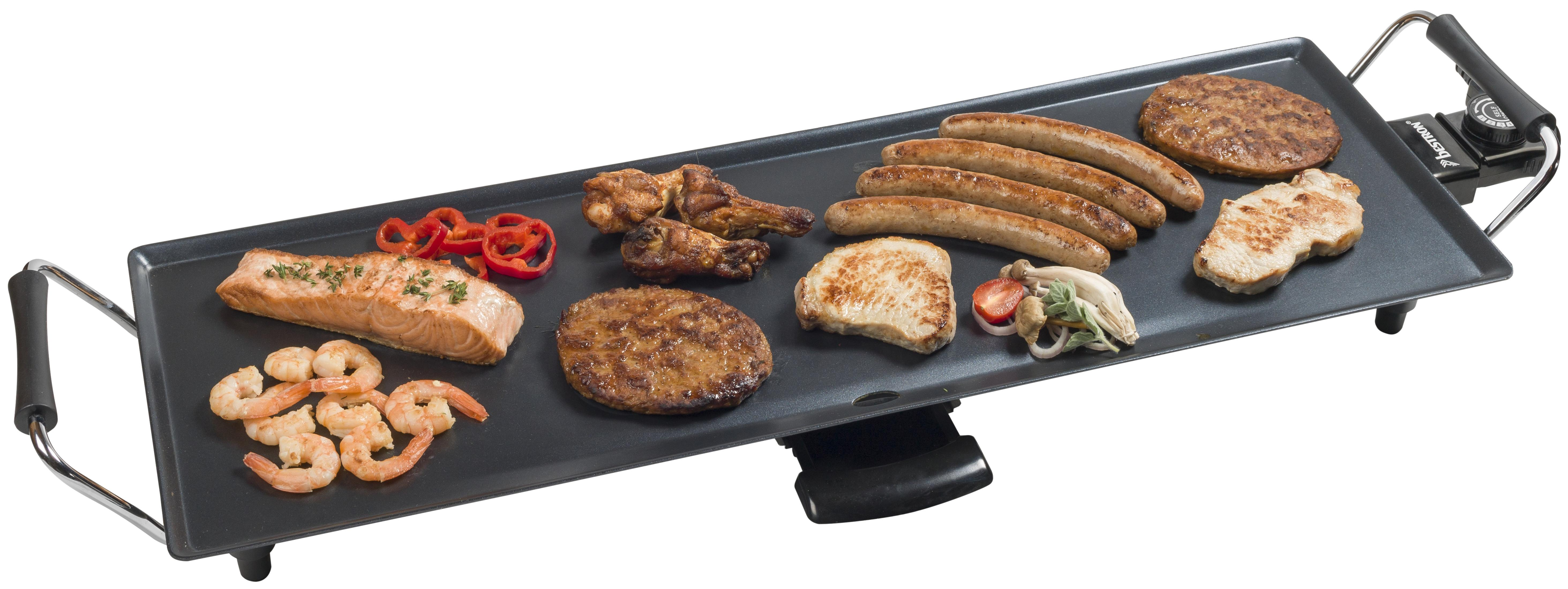 Ein Elektrogrill mit verschiedenen gegarten Speisen: Garnelen, Würstchen, Fleisch, Gemüse.
