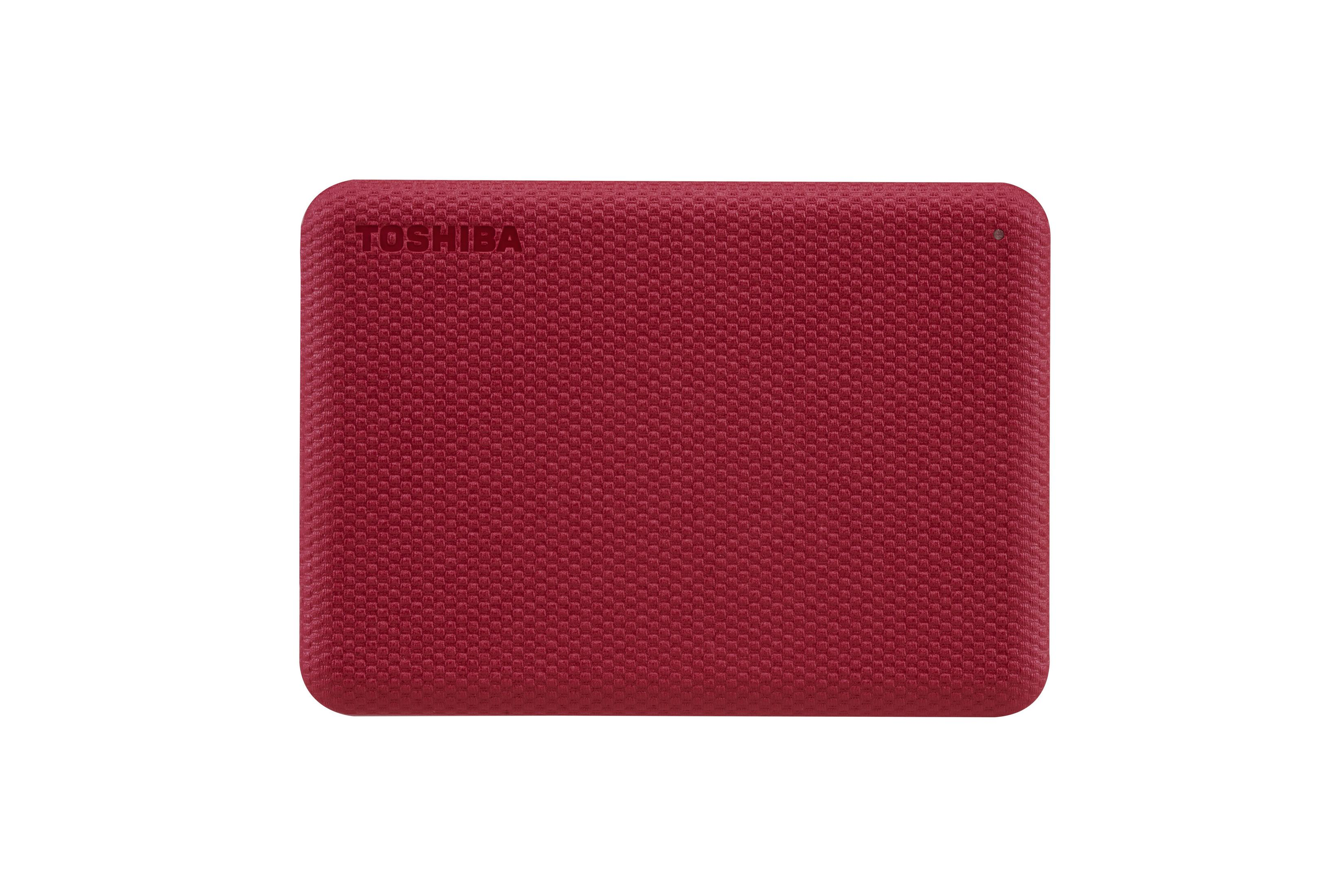 Czerwony, teksturowany zewnętrzny dysk twardy z napisem "TOSHIBA", na białym tle.