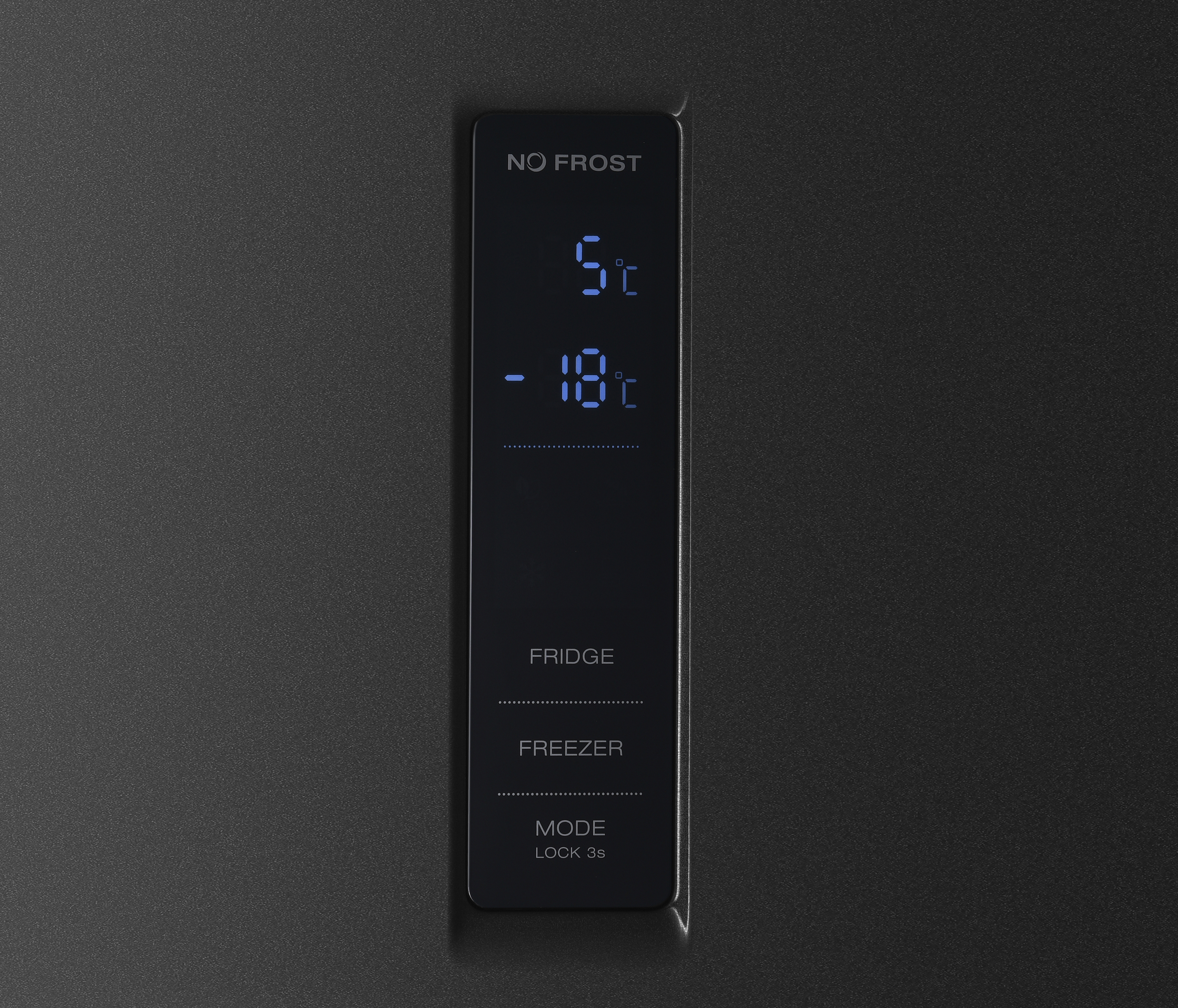 Black refrigerator control panel. Displays fridge and freezer temperatures, 5 and -18 degrees Celsius.