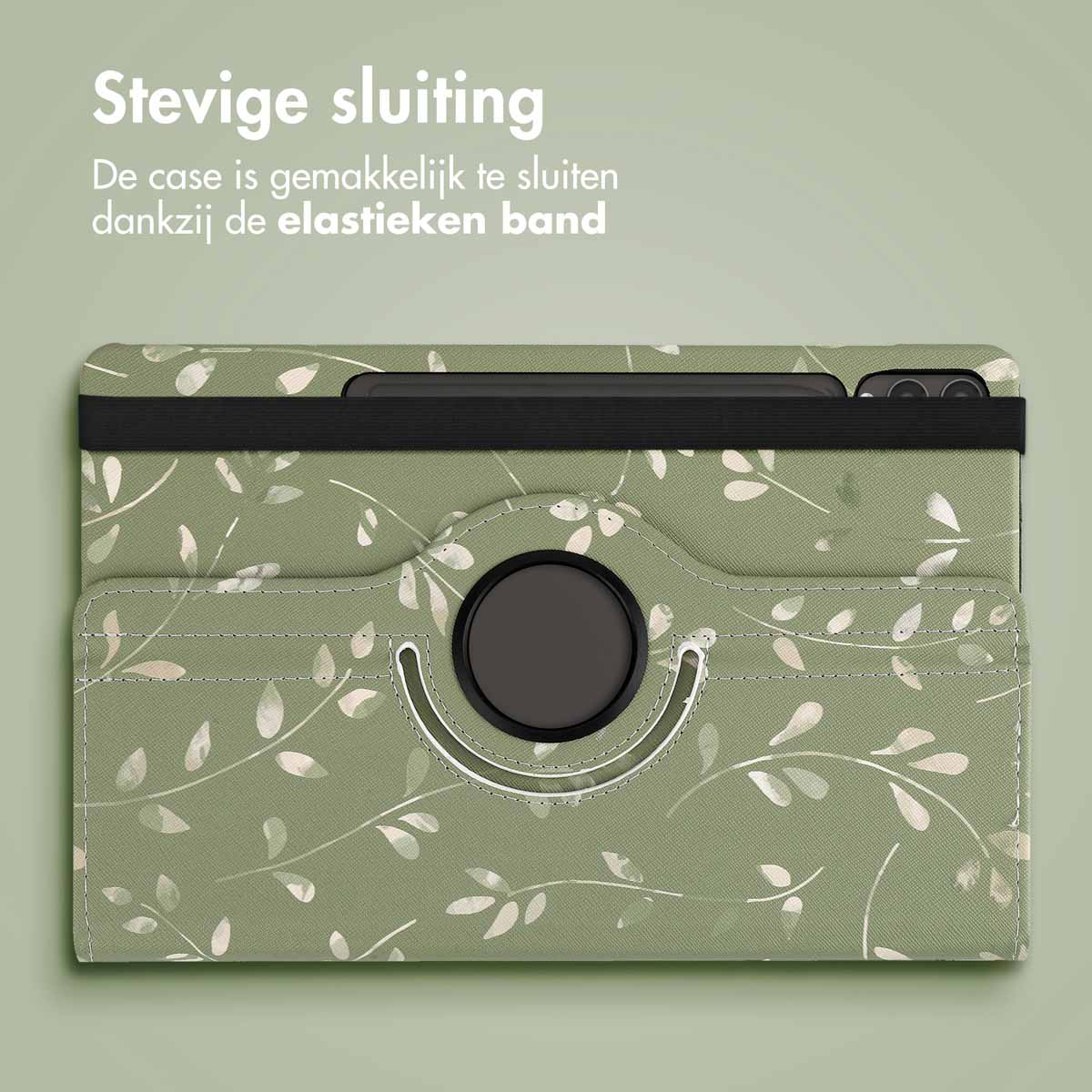 Tablethoes met een groen bloemmotief, gesloten met een zwarte elastische band. Een zwarte cirkel is gecentreerd.