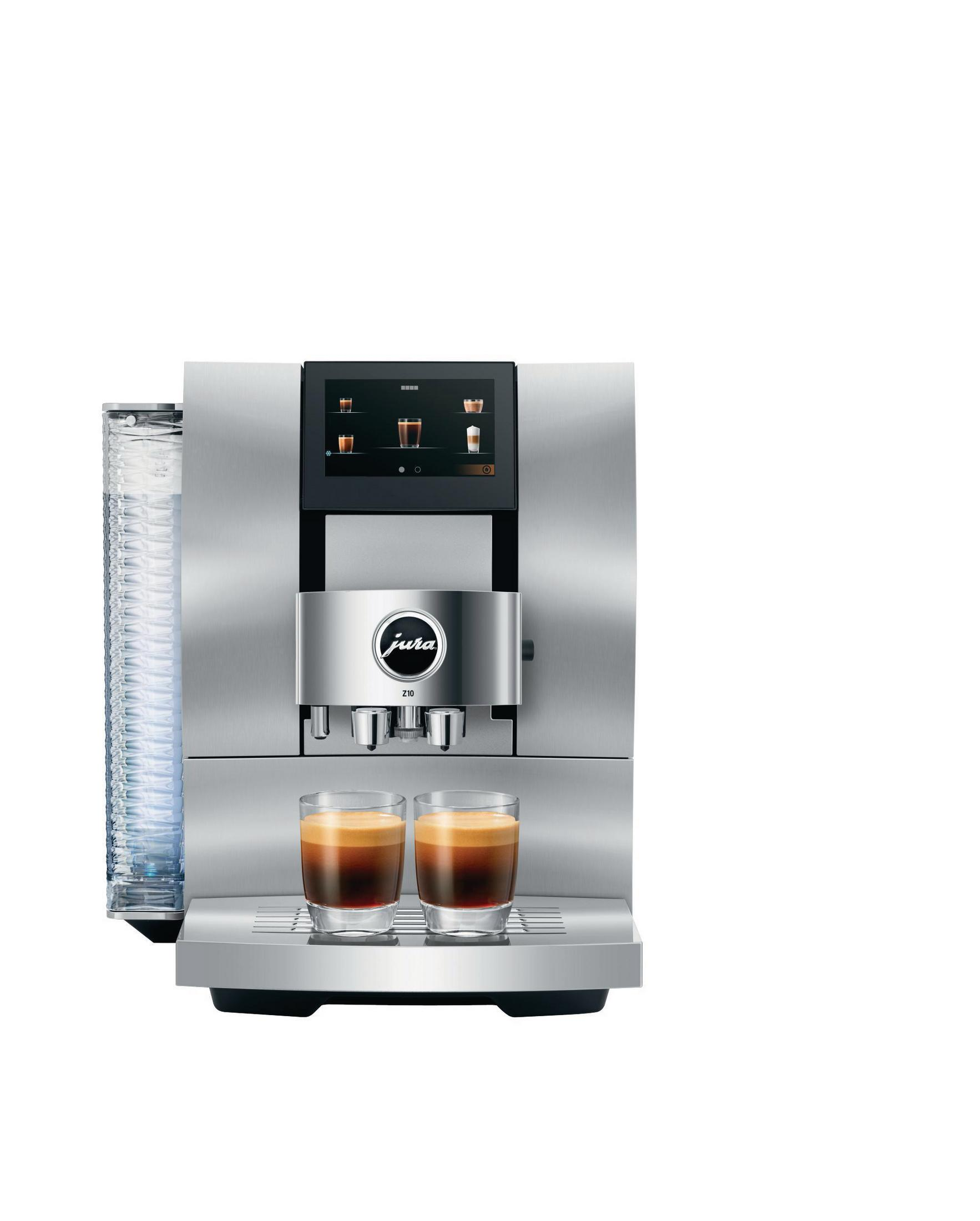 Eine silberne Jura Kaffeemaschine mit zwei Espressogläsern vorne. Ein Bildschirm zeigt Kaffeeoptionen.