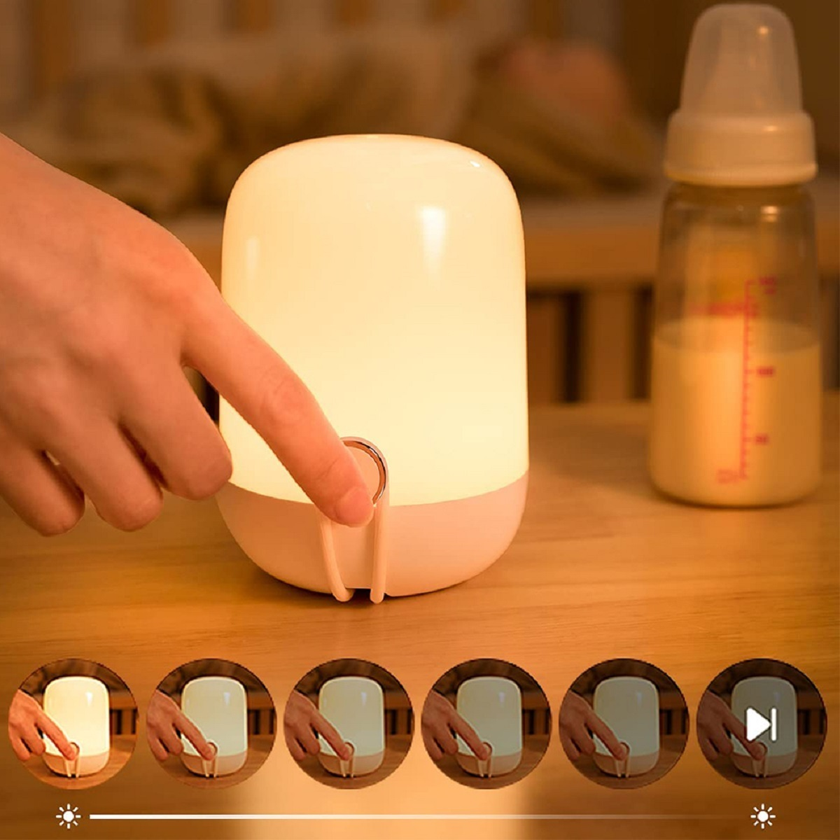 Sanfte Lichtlampe mit Babyflasche und Sequenz der Berührungsaktivierungen.