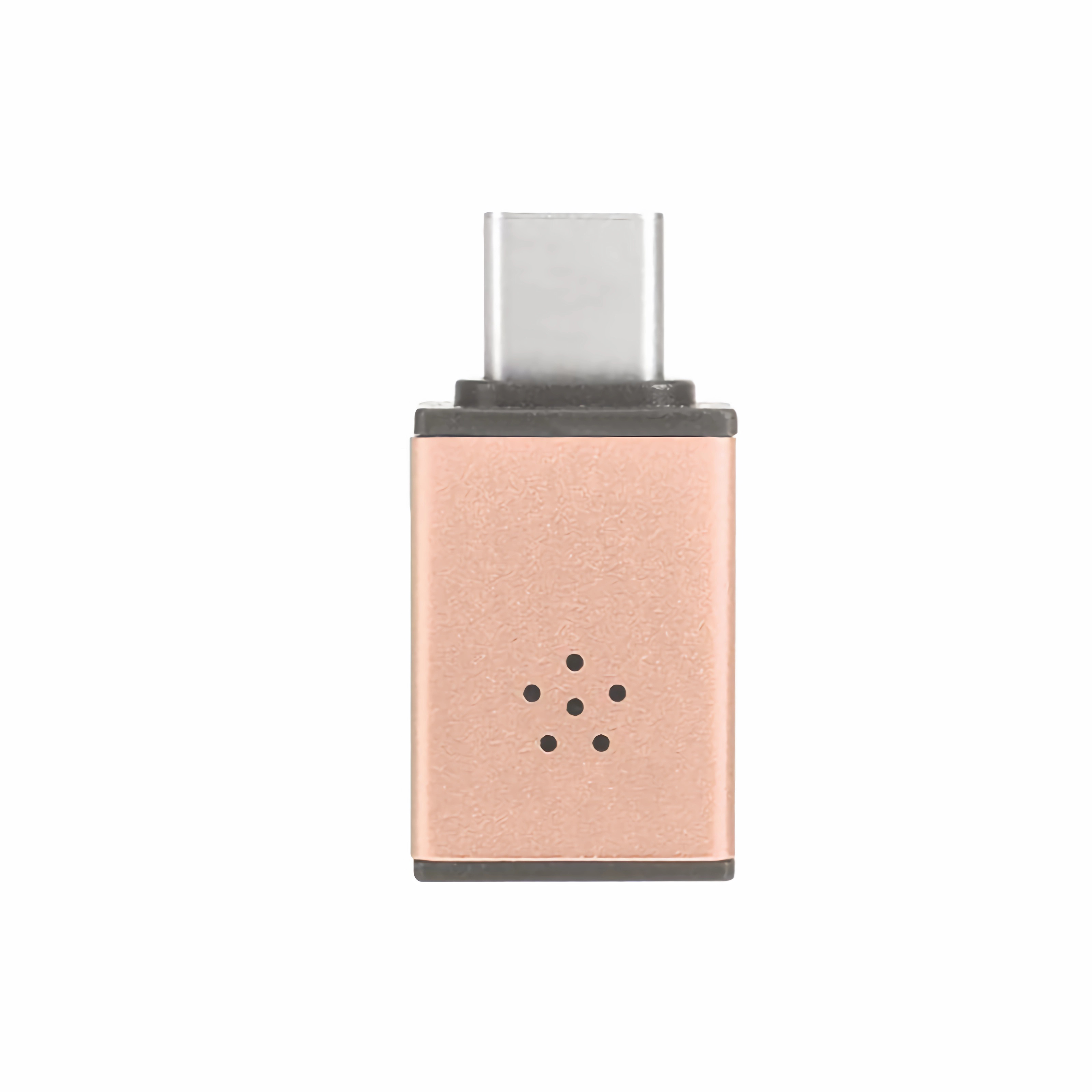 Kupferfarbener Adapter. Er hat einen USB-C-Anschluss. Fünf kleine Löcher sichtbar. Weißer Hintergrund.