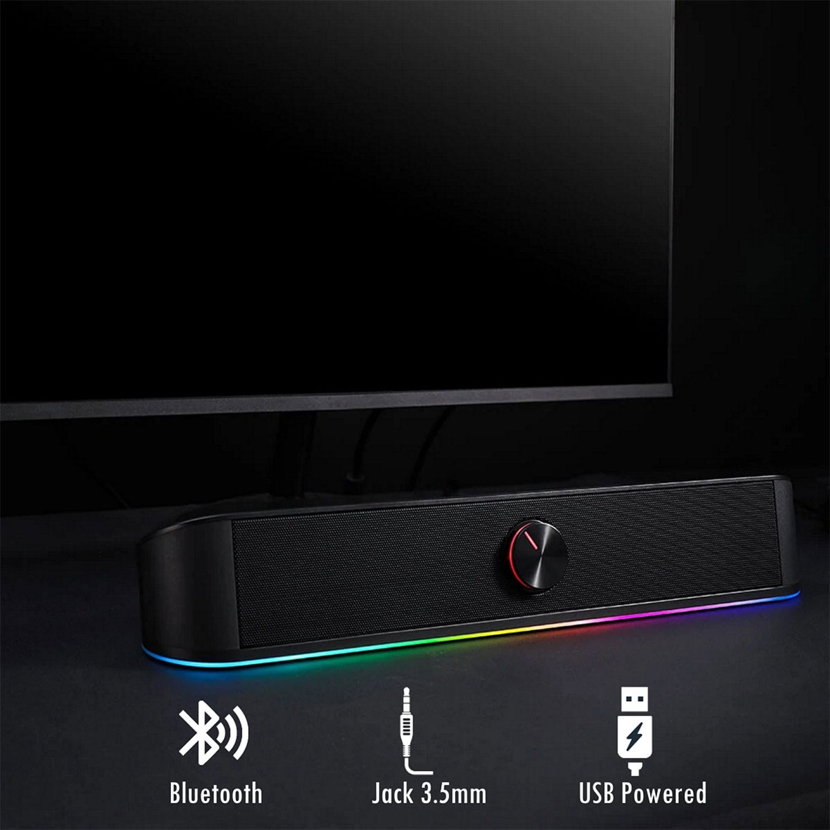Una soundbar nera con illuminazione colorata, Bluetooth, jack da 3,5 mm e simboli di alimentazione USB.