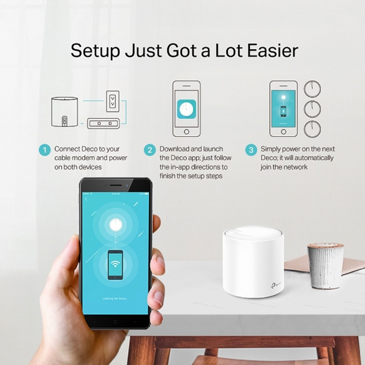 Obraz przedstawiający konfigurację urządzenia Deco dla sieci. Dłoń trzyma telefon.