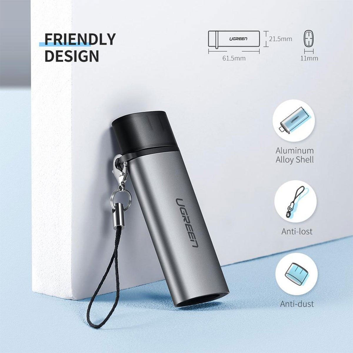 Szara pamięć USB UGREEN. Pokazuje wymiary i funkcje, takie jak odporność na kurz, zabezpieczenie przed zgubieniem i aluminiowa obudowa.