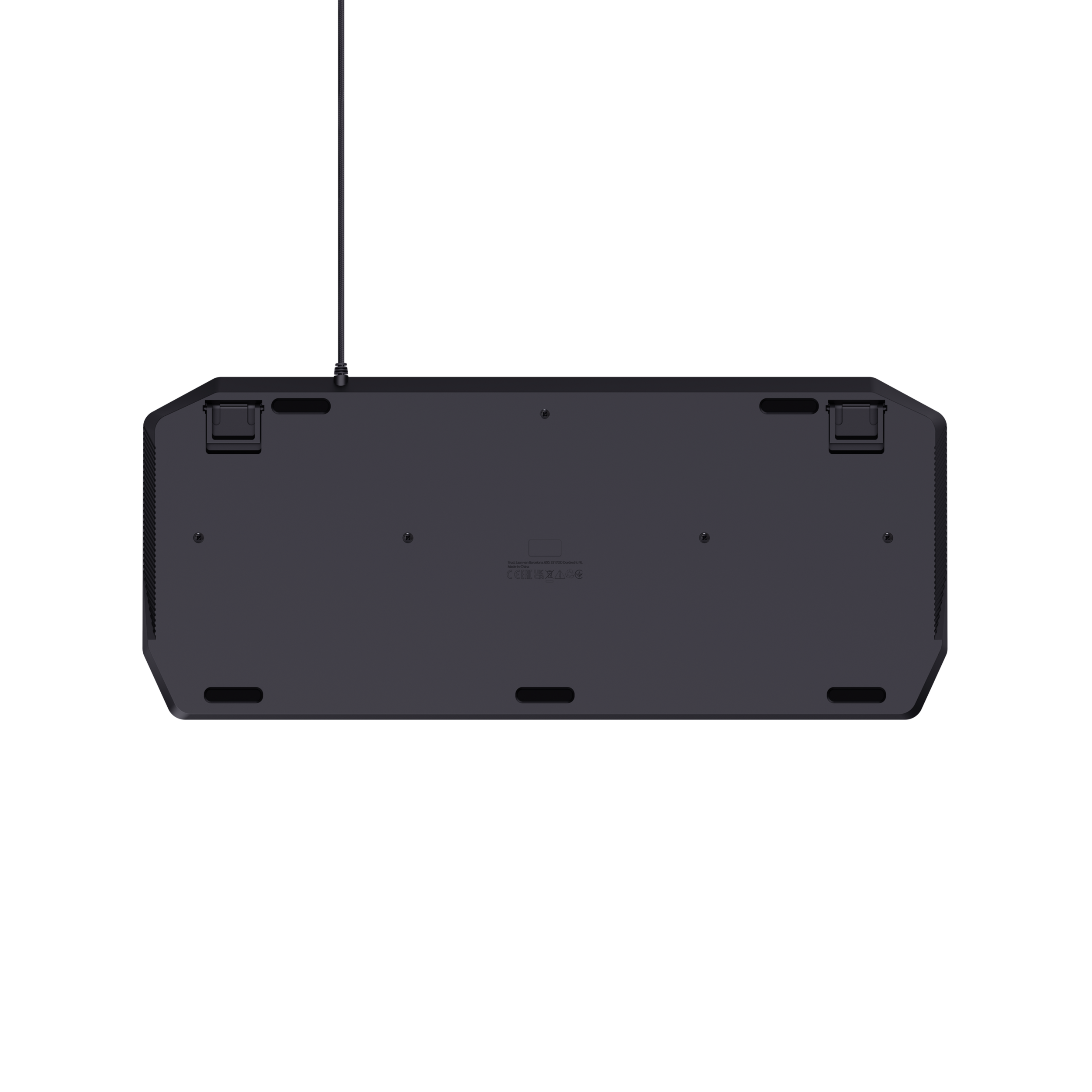 Black underside of a keyboard with a cord attached. Black background.