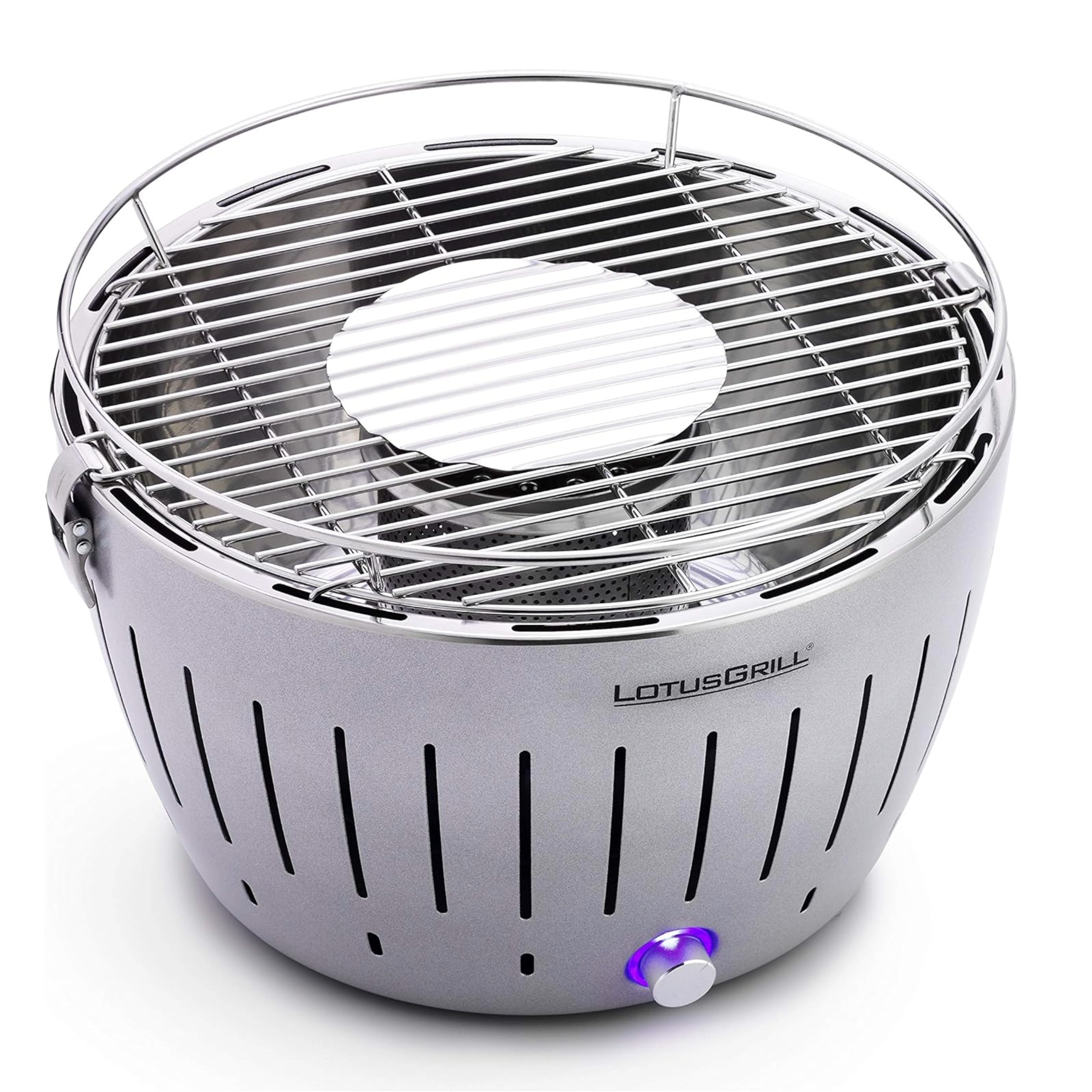 Silberner LotusGrill auf weißem Hintergrund. Der Grill hat einen lila Einschaltknopf.