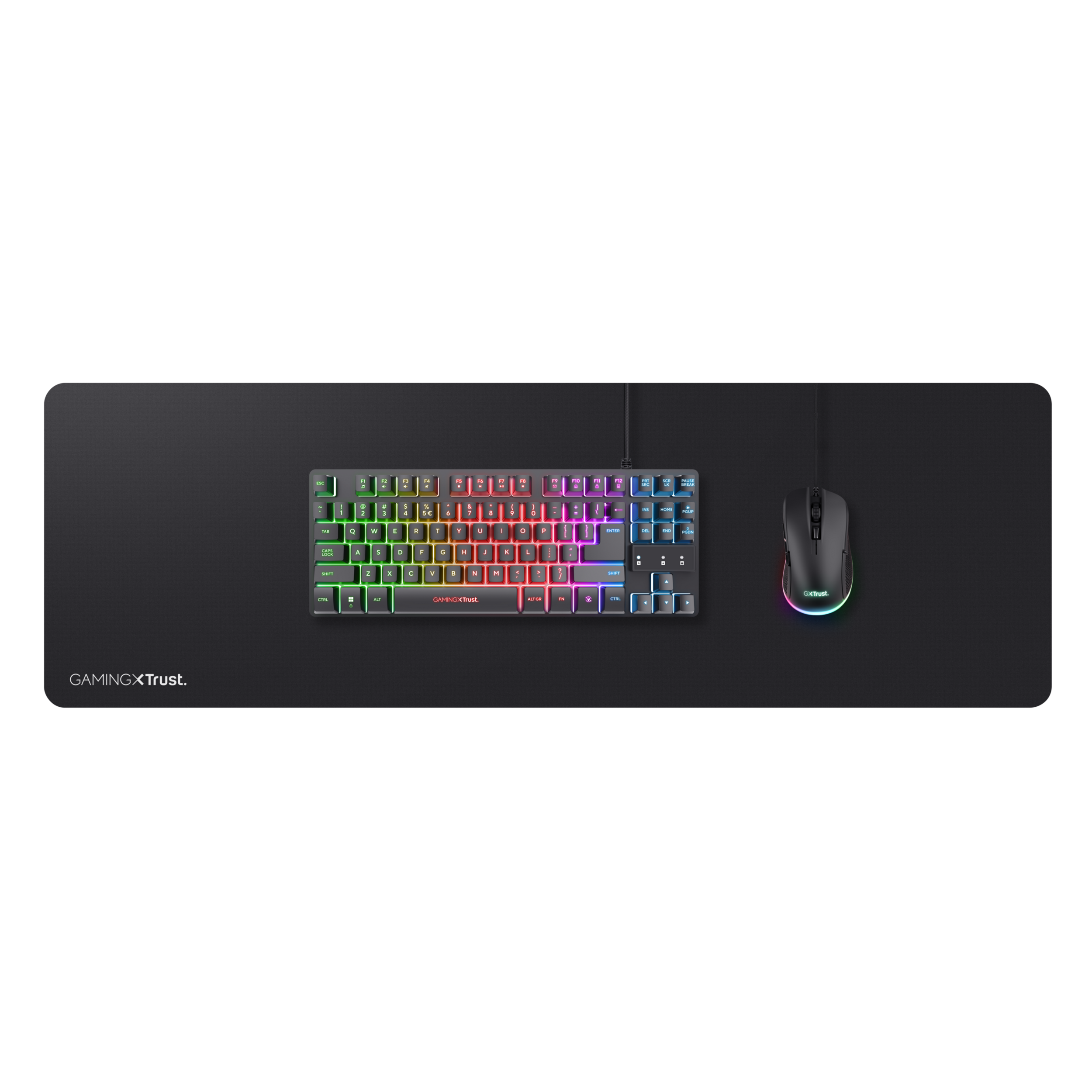 Souris et clavier de jeu noirs sur un grand tapis de souris noir avec lumière colorée.