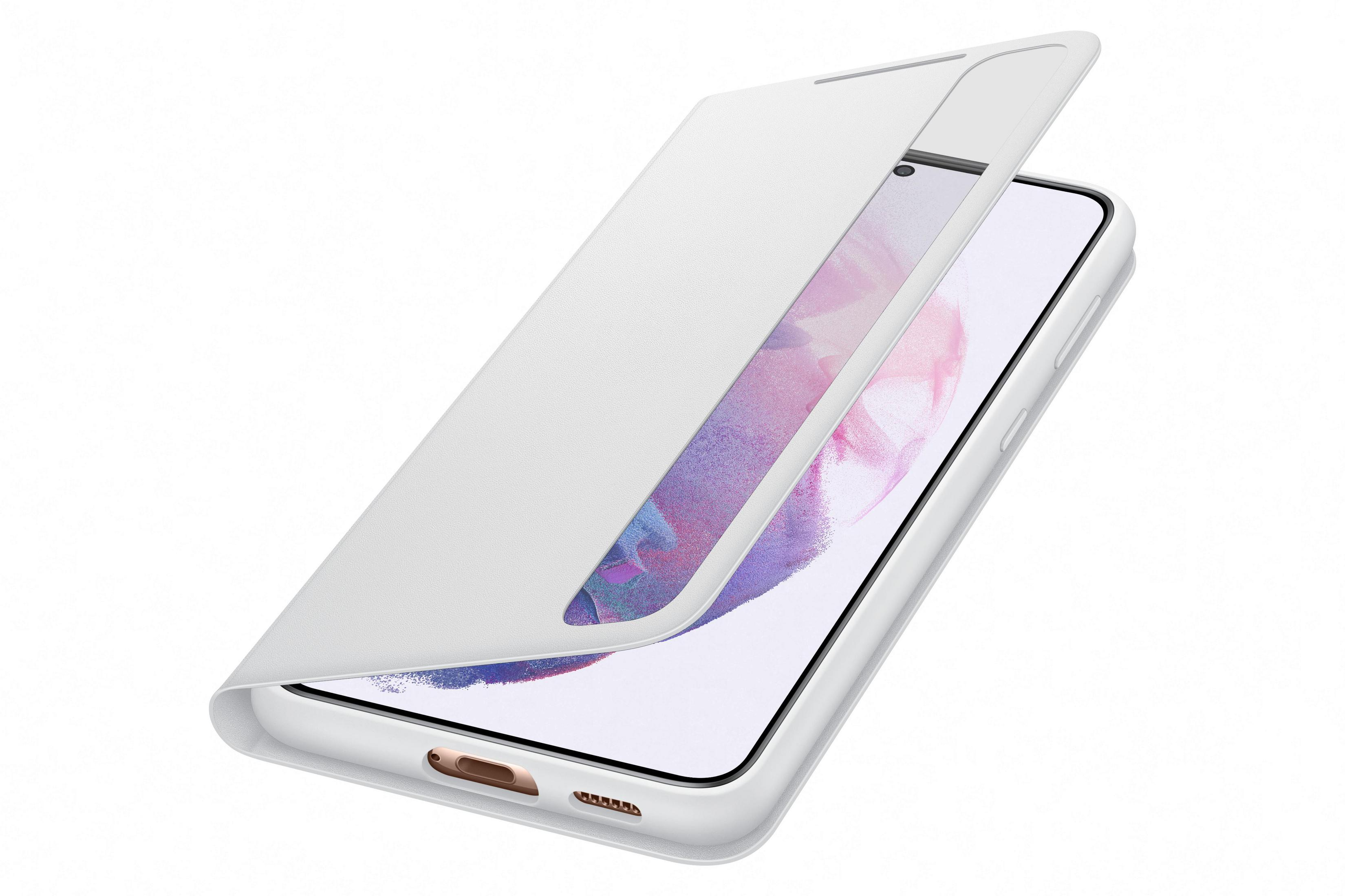 Funda blanca para teléfono con tapa abatible abierta, revelando pantalla con diseño colorido.