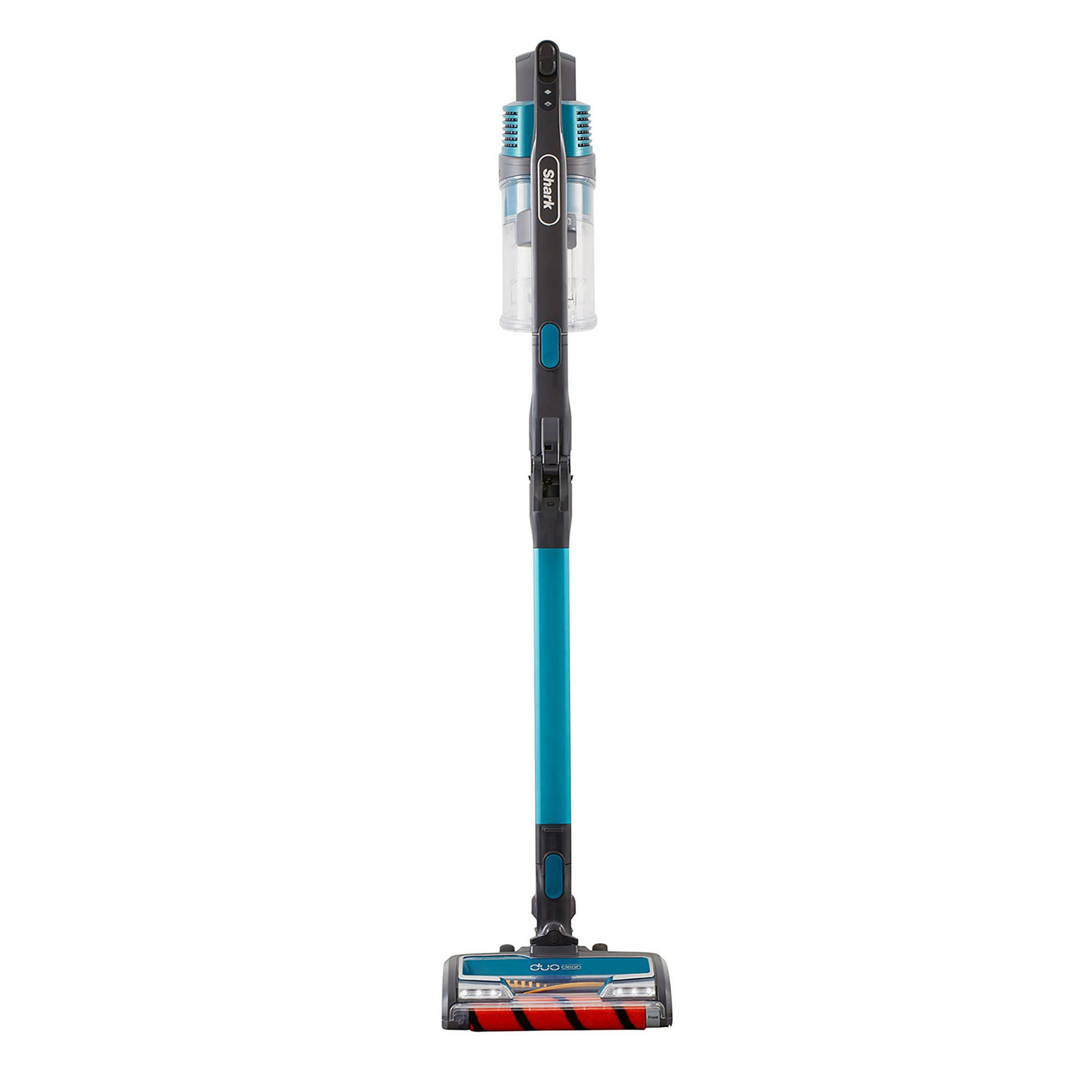 Aspiradora vertical. Turquesa y negro con un depósito transparente y un cepillo rojo.