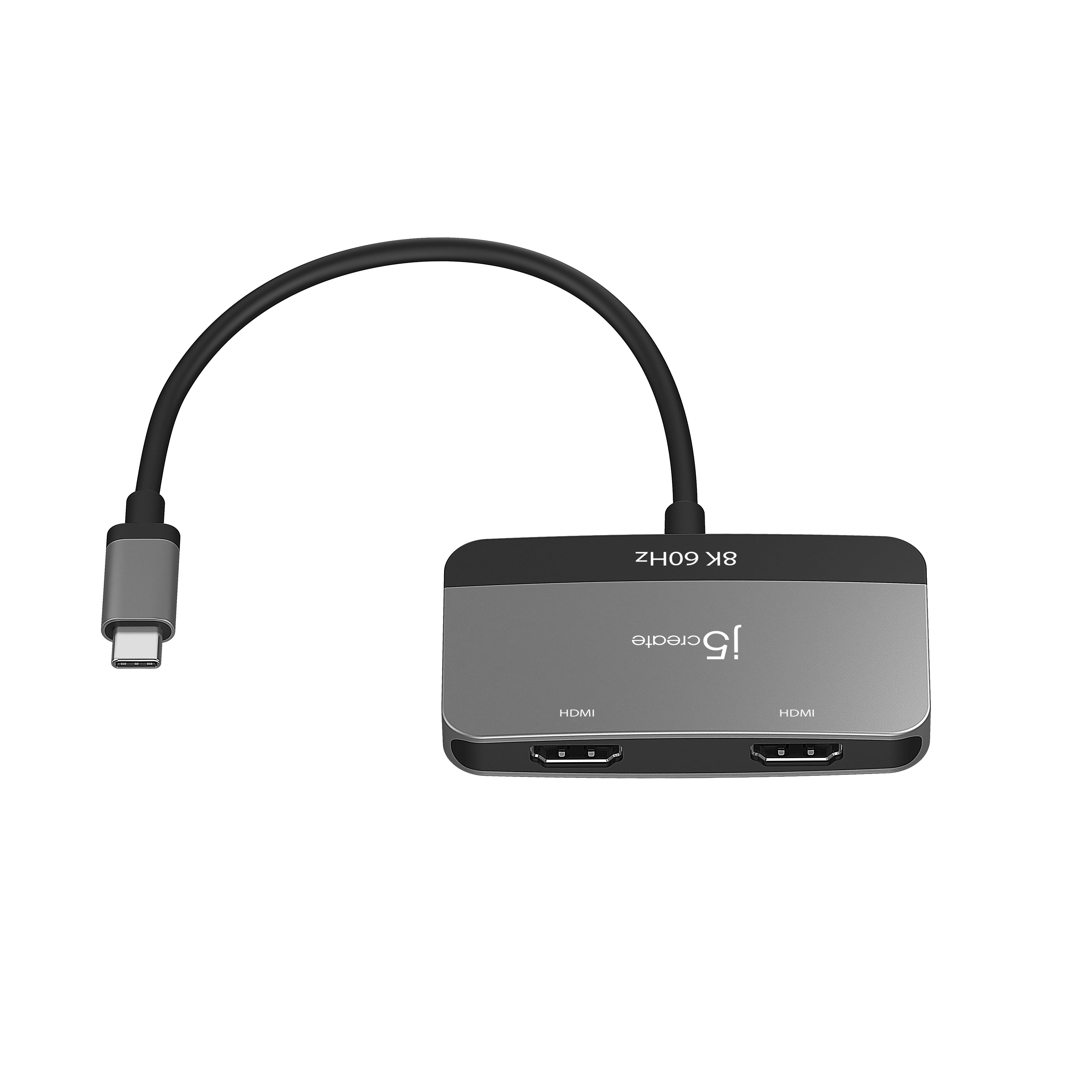 Silberner USB-C-Hub mit HDMI-Anschlüssen. Schwarzes USB-C-Kabel und zwei HDMI-Anschlüsse an der Seite.