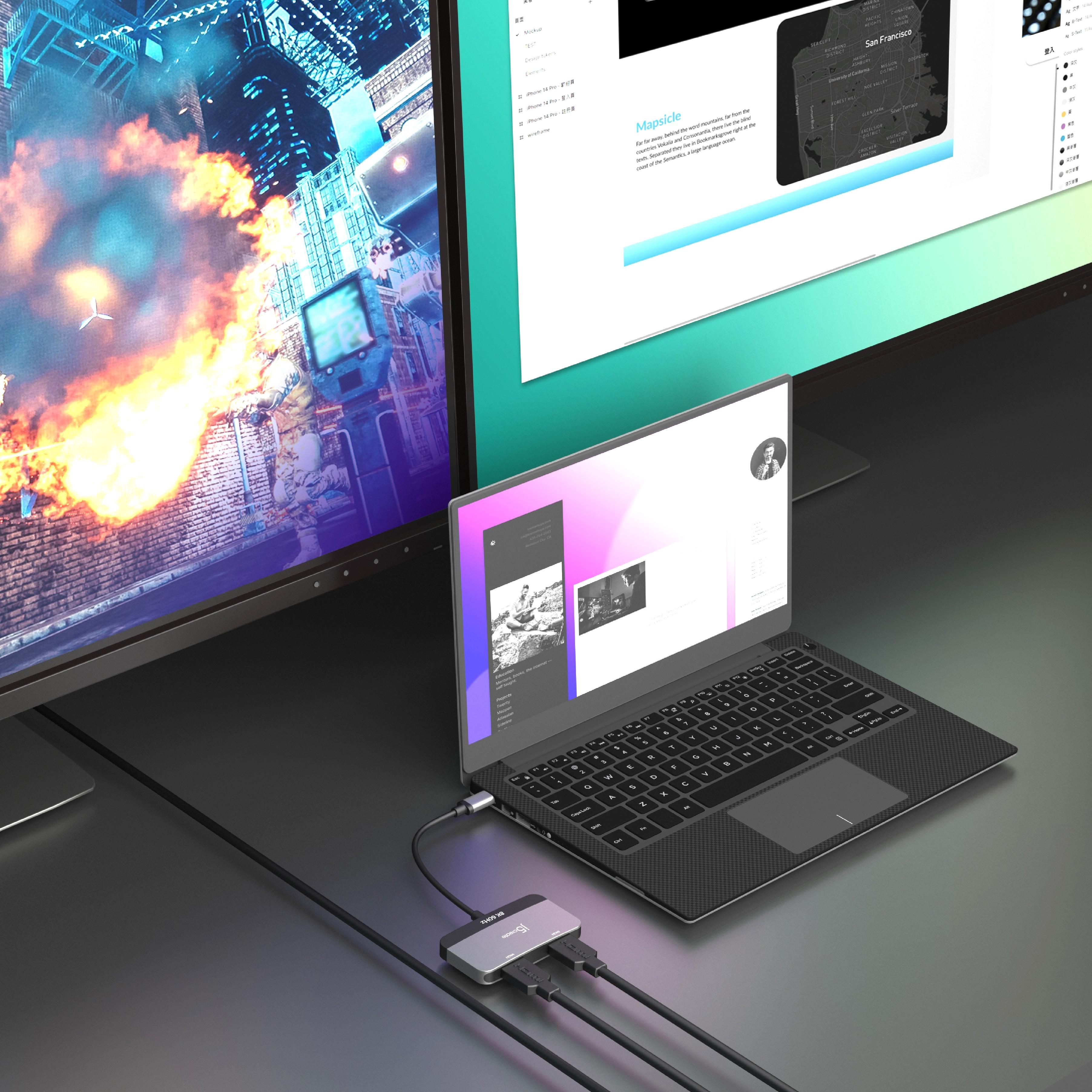 Laptop, verbunden mit zwei Monitoren, Hub und Kabeln auf schwarzer Oberfläche mit Stadtansicht.