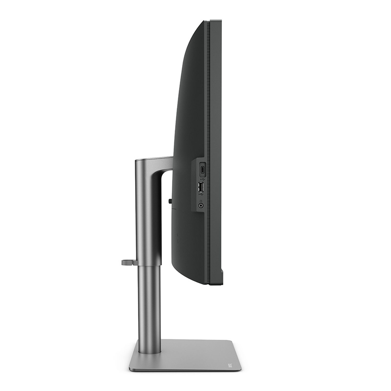 Side view of a monitor with a stand, it's dark grey.