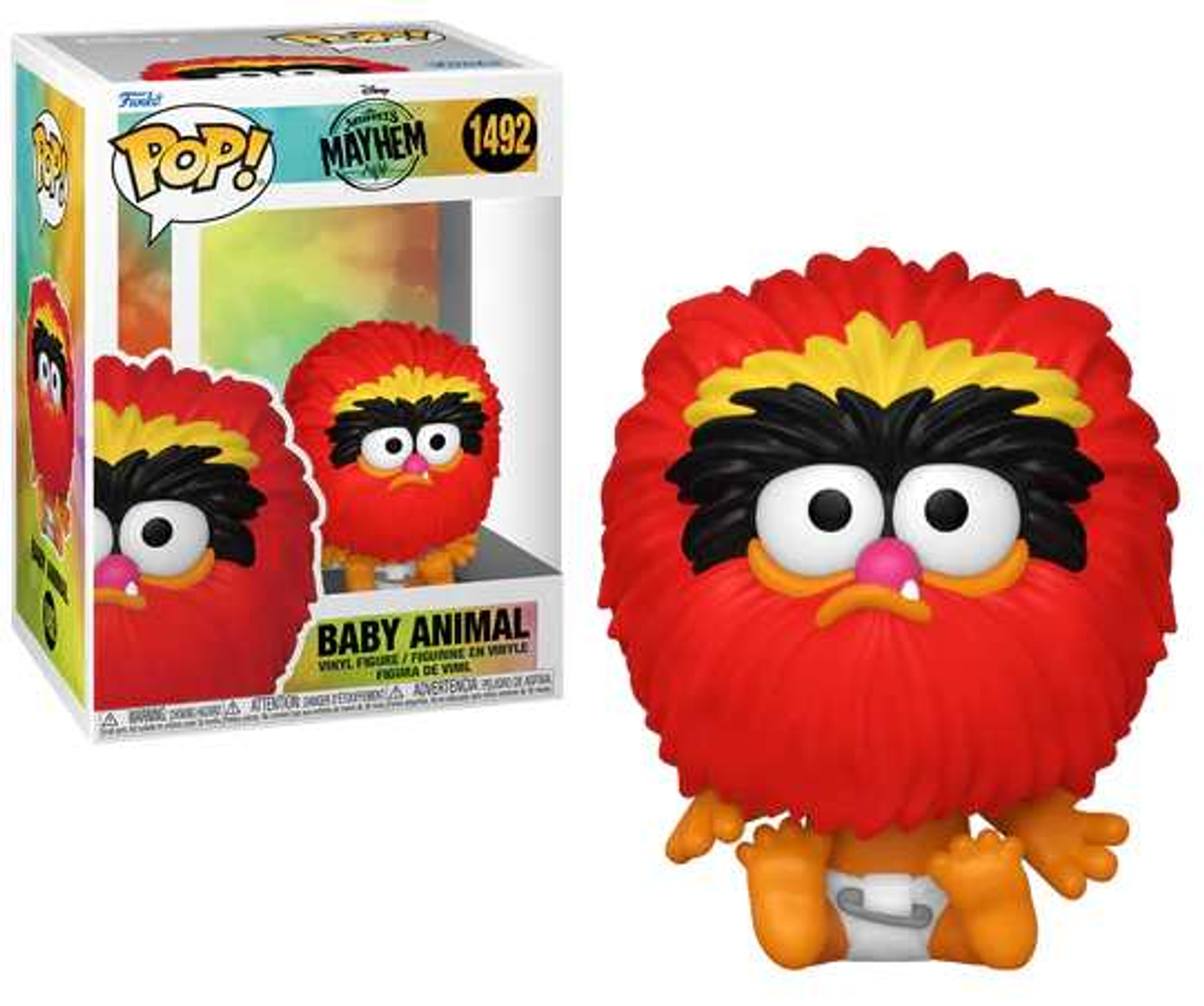 Una figura de Baby Animal de los Muppets. Es rojo con pelo amarillo y un chupete.