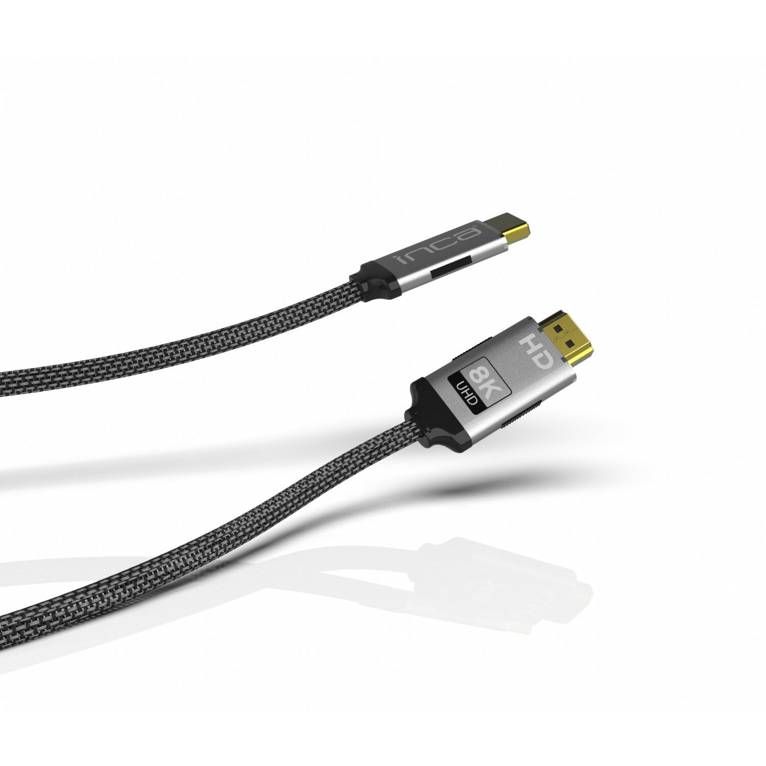 Beyaz zemin üzerinde iki siyah ve gri HDMI kablosu.