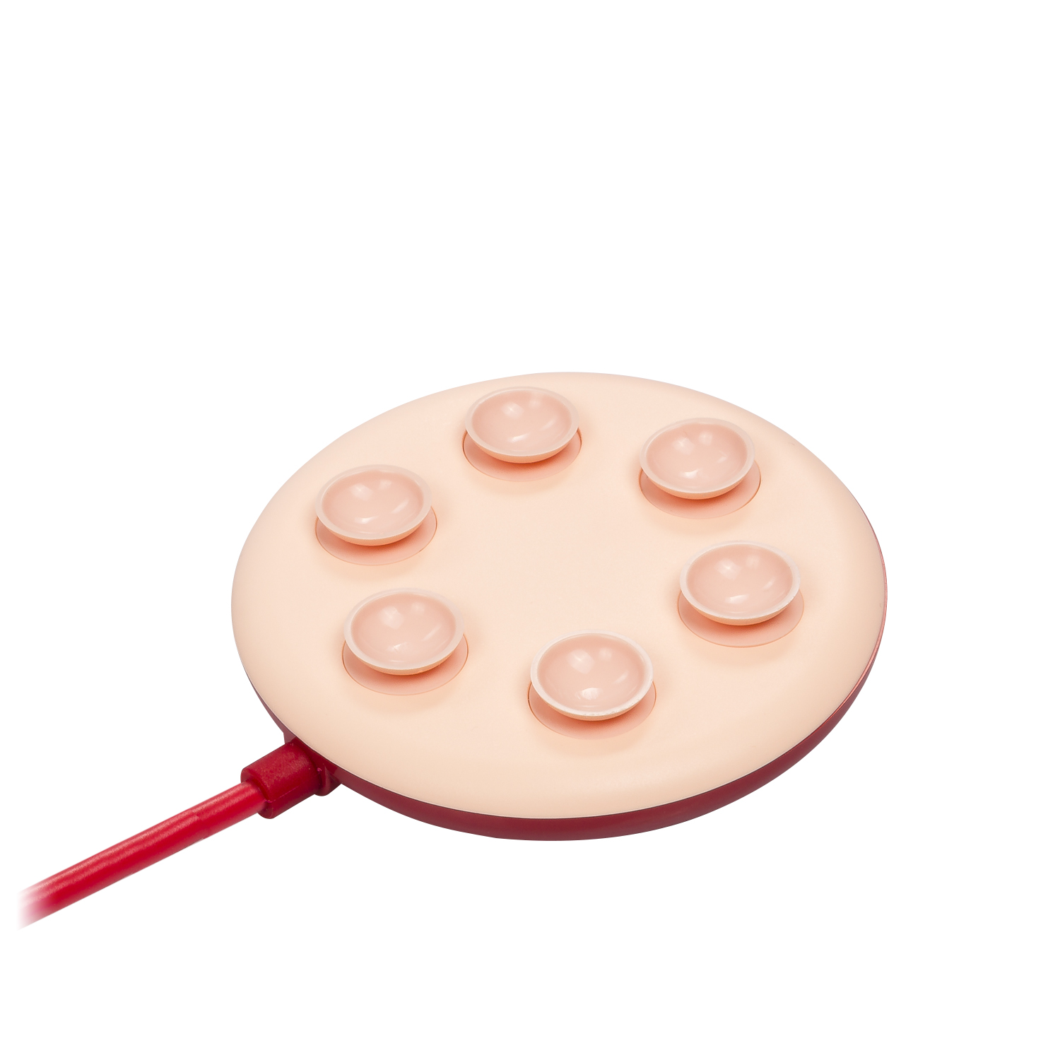 Un dispositivo médico beige con 6 ventosas rosas y un cable rojo.