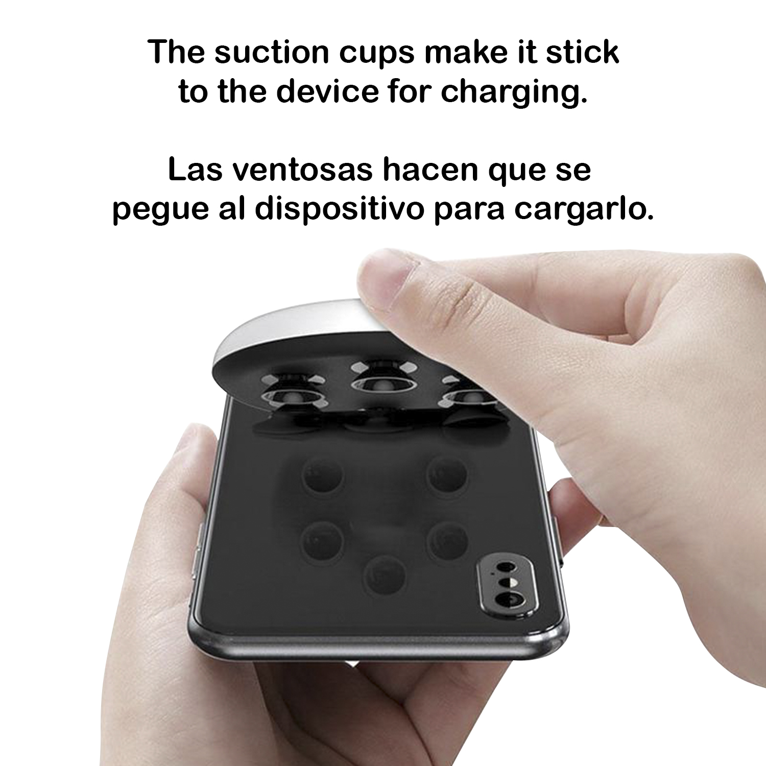 Mani che tengono un caricabatterie per telefono bianco e argento con ventose, attaccandolo a un telefono nero.