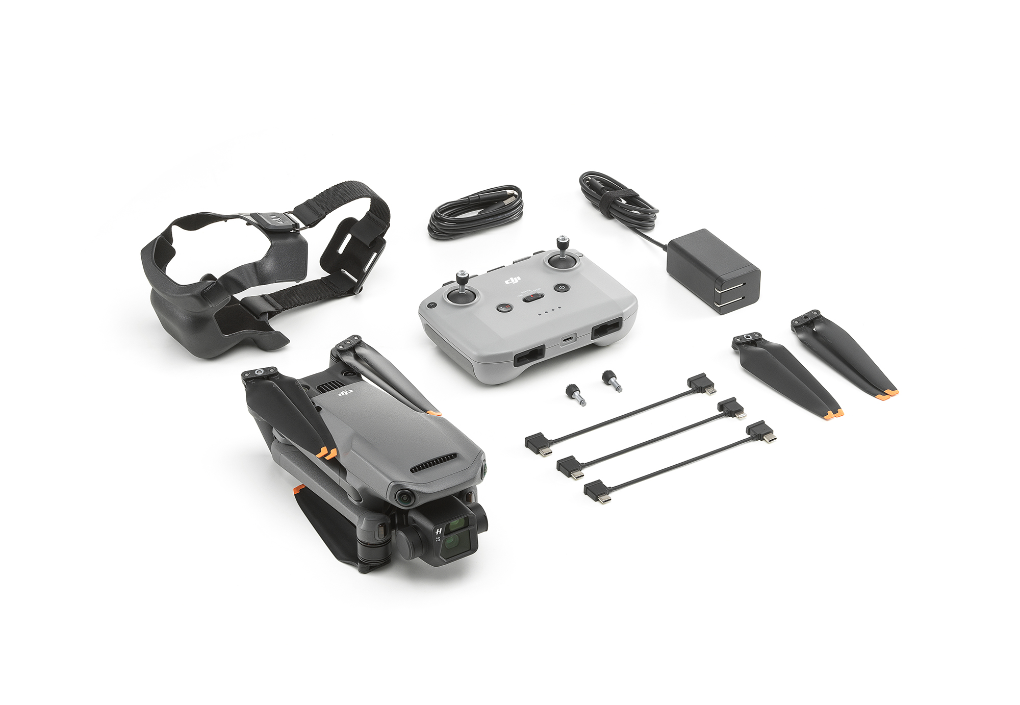 Drohnen-Kit mit Drohne, Fernbedienung, Brille, Kabeln, Propellern und Ladegerät.