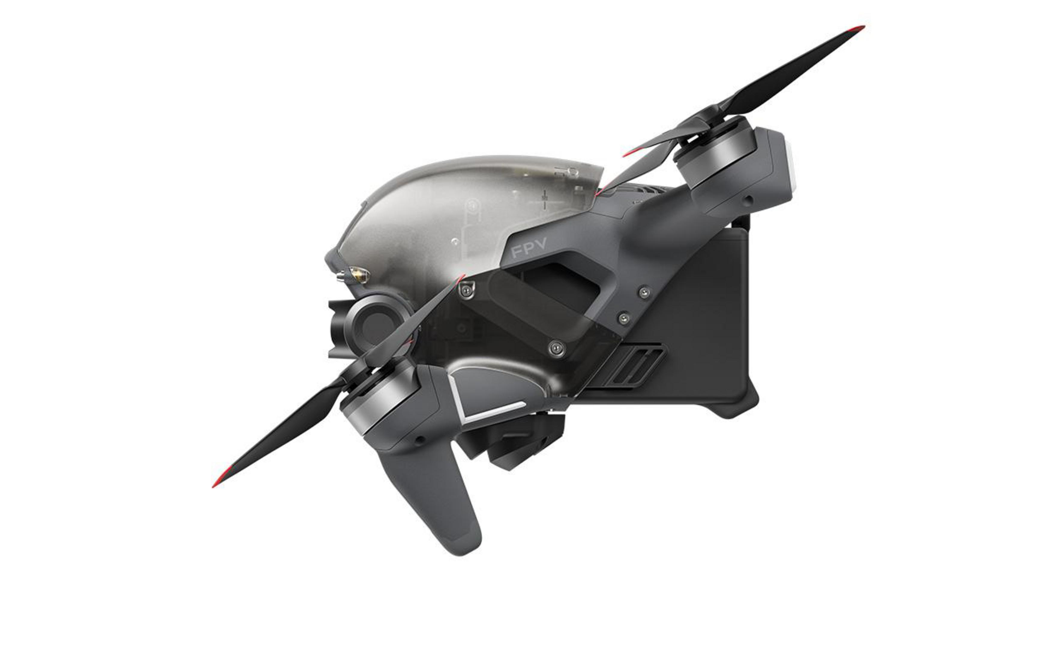 Eine grau-schwarze FPV-Drohne, die ihre Propeller und Designdetails auf weißem Hintergrund zeigt.