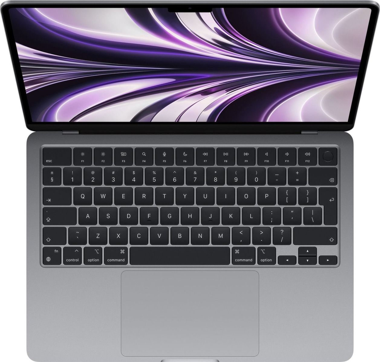 Laptop, aperto, vista dall'alto. Tastiera nera con tasti argentati. Corpo grigio con schermo che mostra uno sfondo viola.