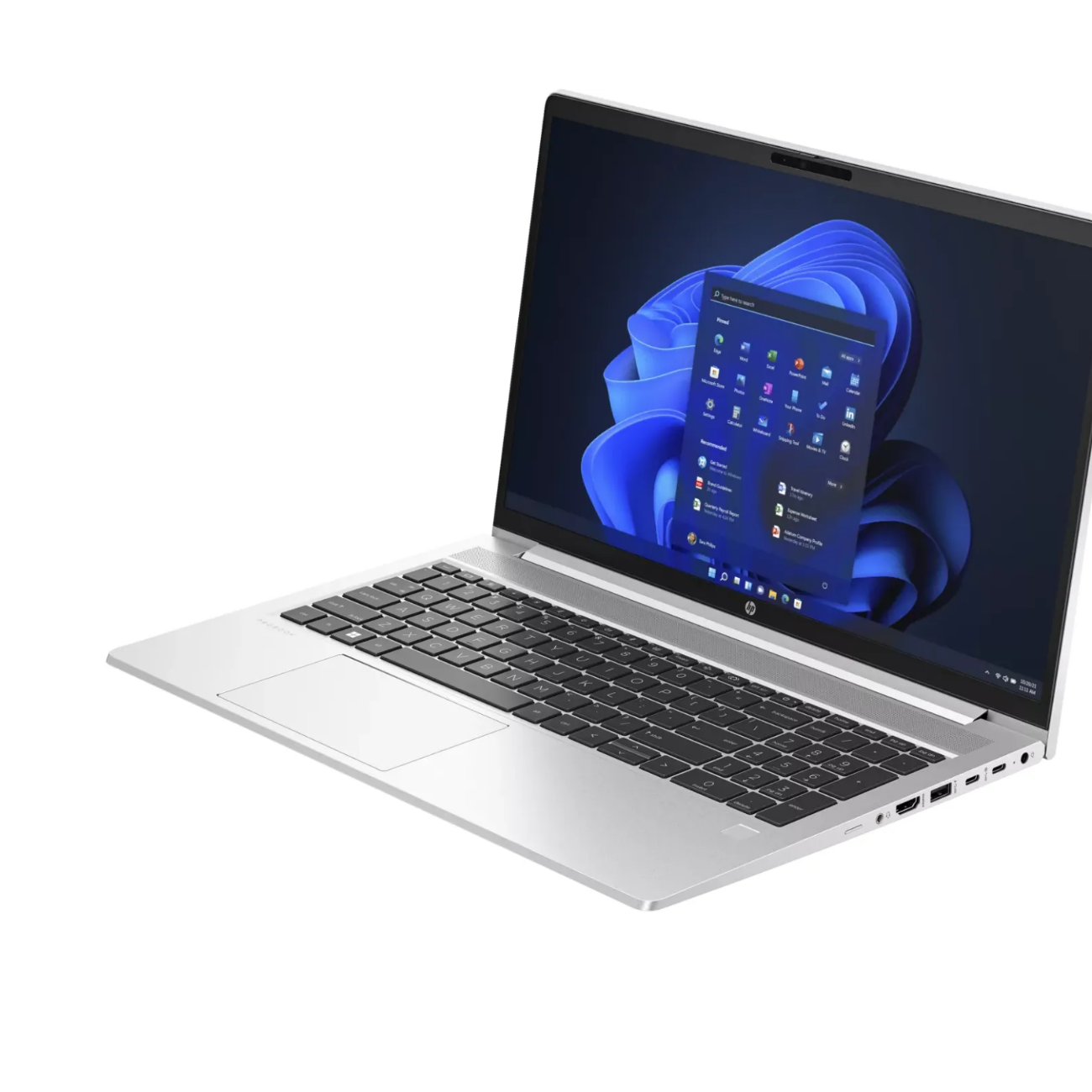 Srebrny laptop z otwartym ekranem, wyświetlający niebieską tapetę Windows 11.