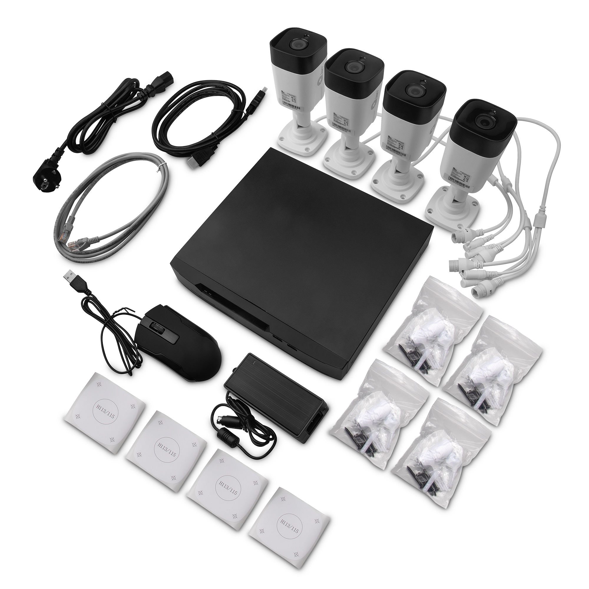 Un sistema de cámaras de seguridad con cuatro cámaras, un DVR y otros accesorios en blanco.