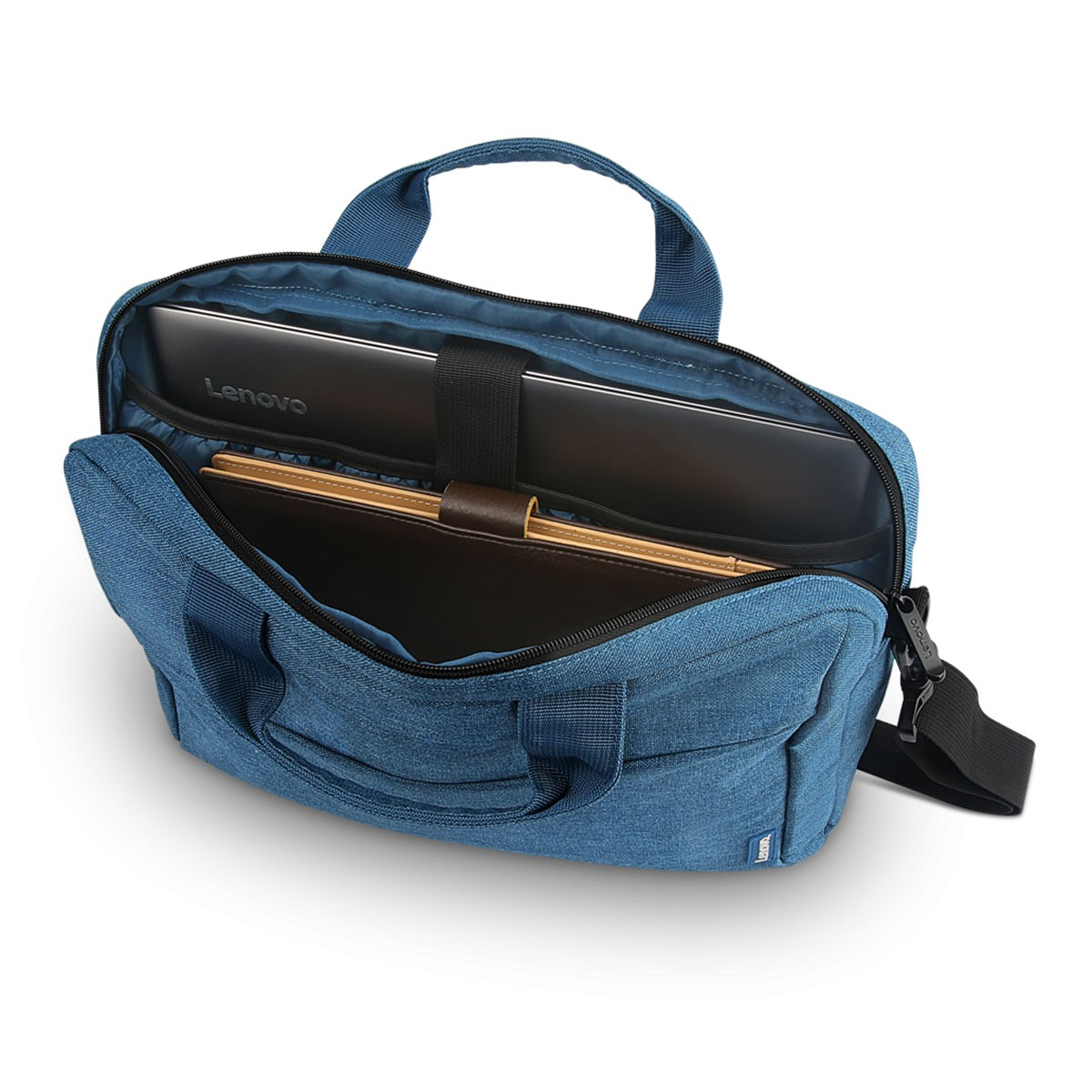 Blaue Laptoptasche offen, zeigt Lenovo Laptop und braunes Notizbuch.