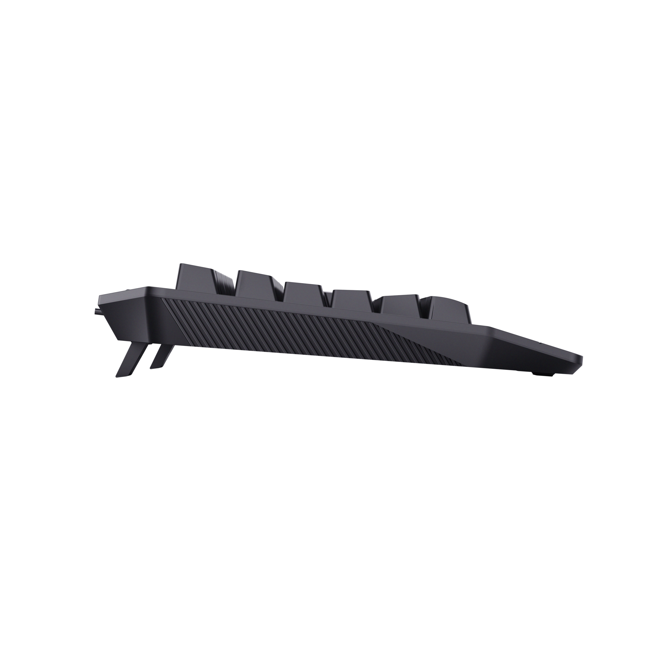 Widok z boku czarnej klawiatury z podniesionymi nóżkami, na czarnej powierzchni.