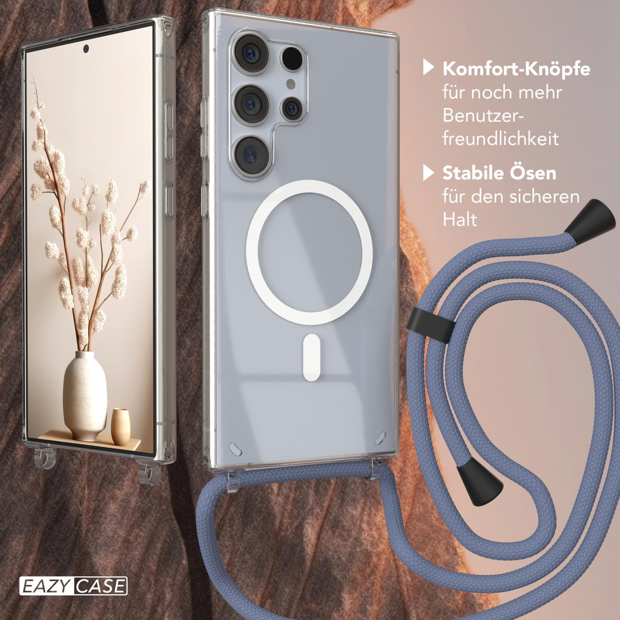 Ein Telefon mit klarer Hülle und blauem Riemen, plus Vase und Blumen.