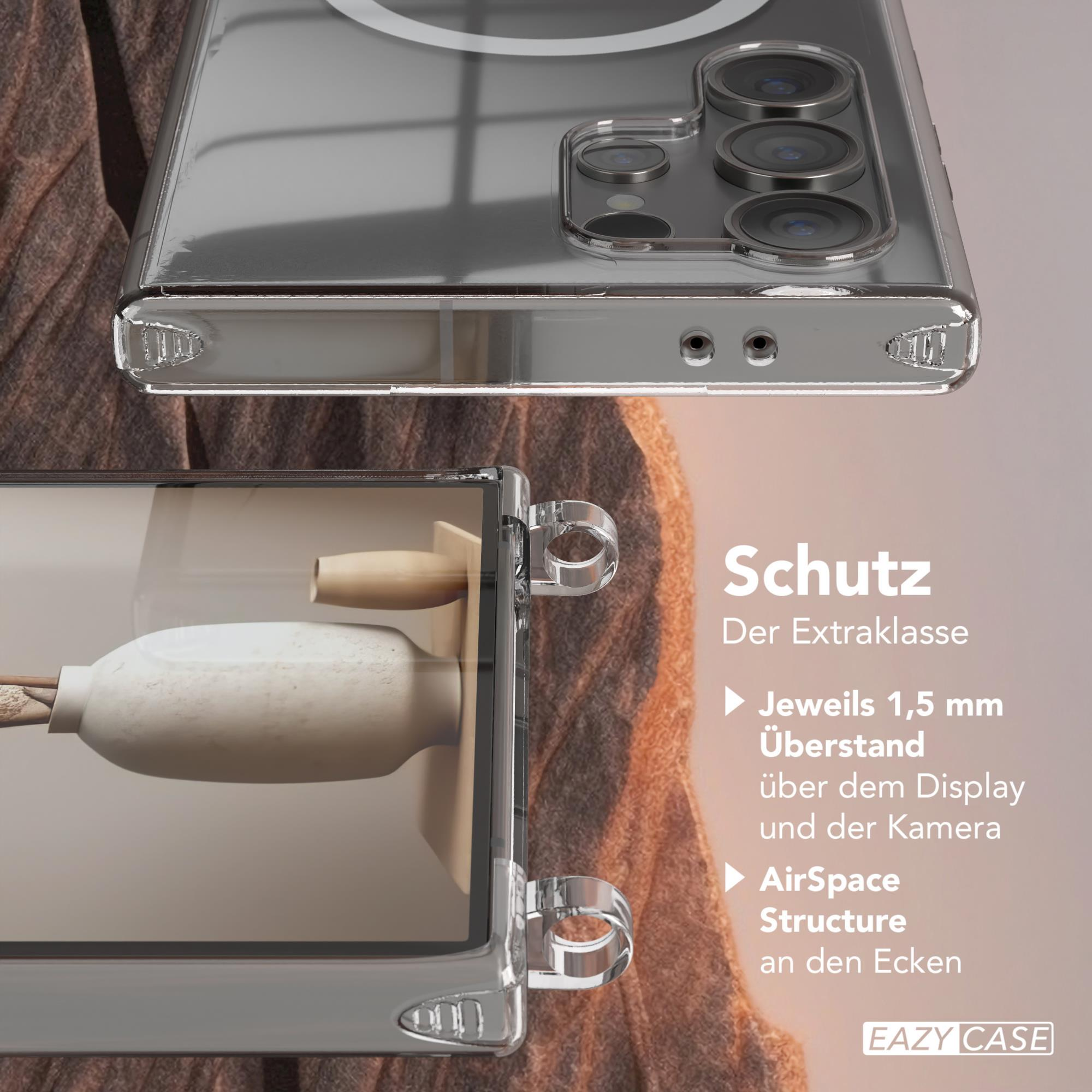 Nahaufnahme einer Handyhülle mit einem Telefon darin. Die Hülle ist transparent und hat silberne Akzente. Text: EAZY CASE.