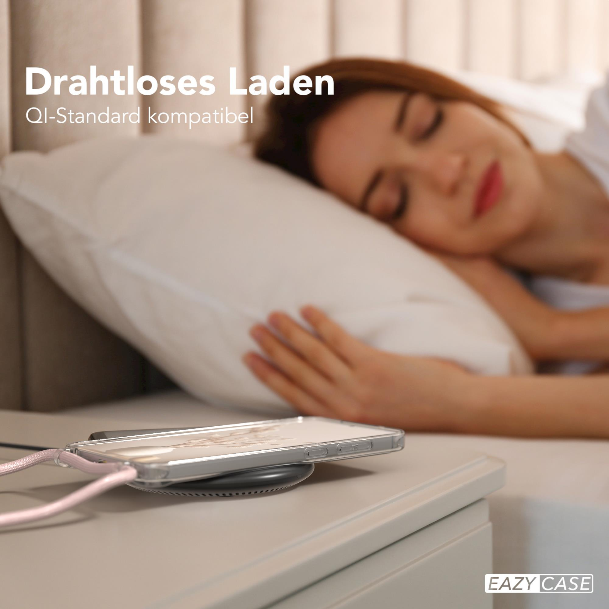 Schlafende Person, Telefon, das auf einem Nachttisch geladen wird, mit einem kabellosen Ladegerät.