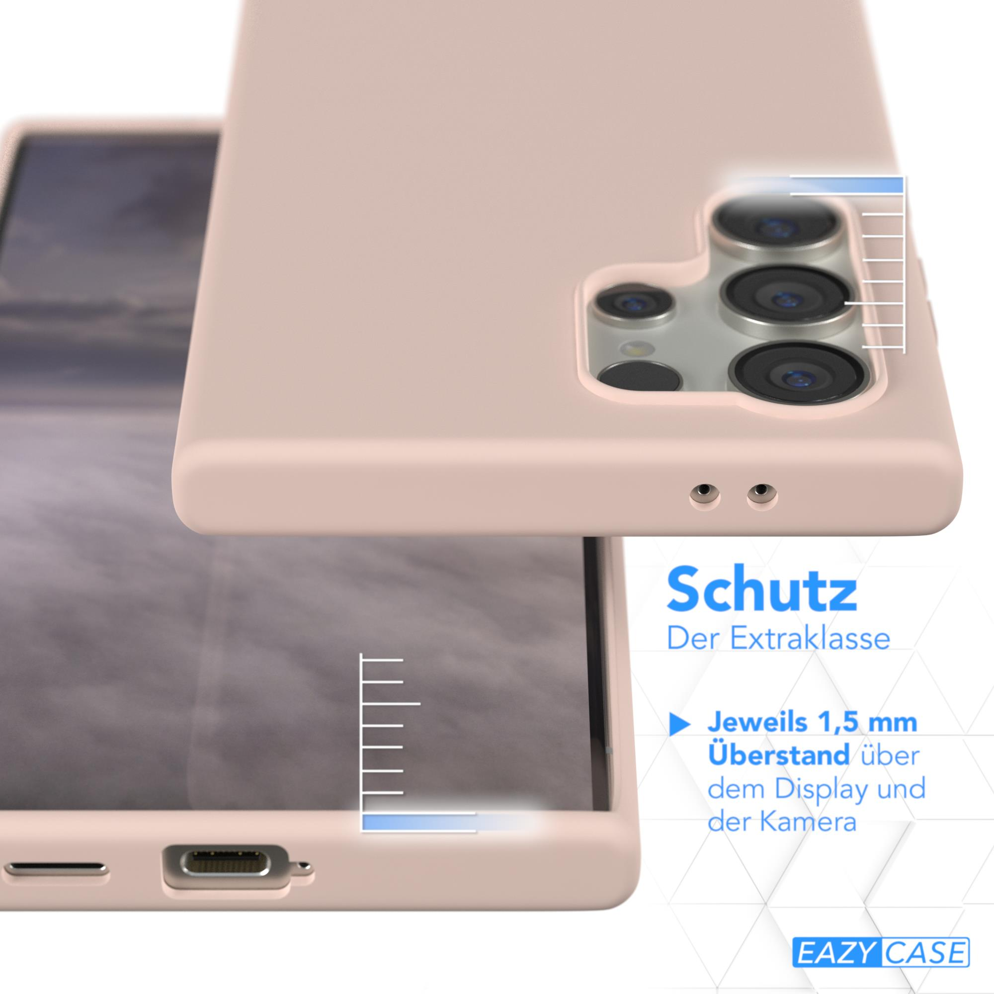 Rosa Handyhülle über einem Telefon, mit einem Hintergrund von Bergkette.