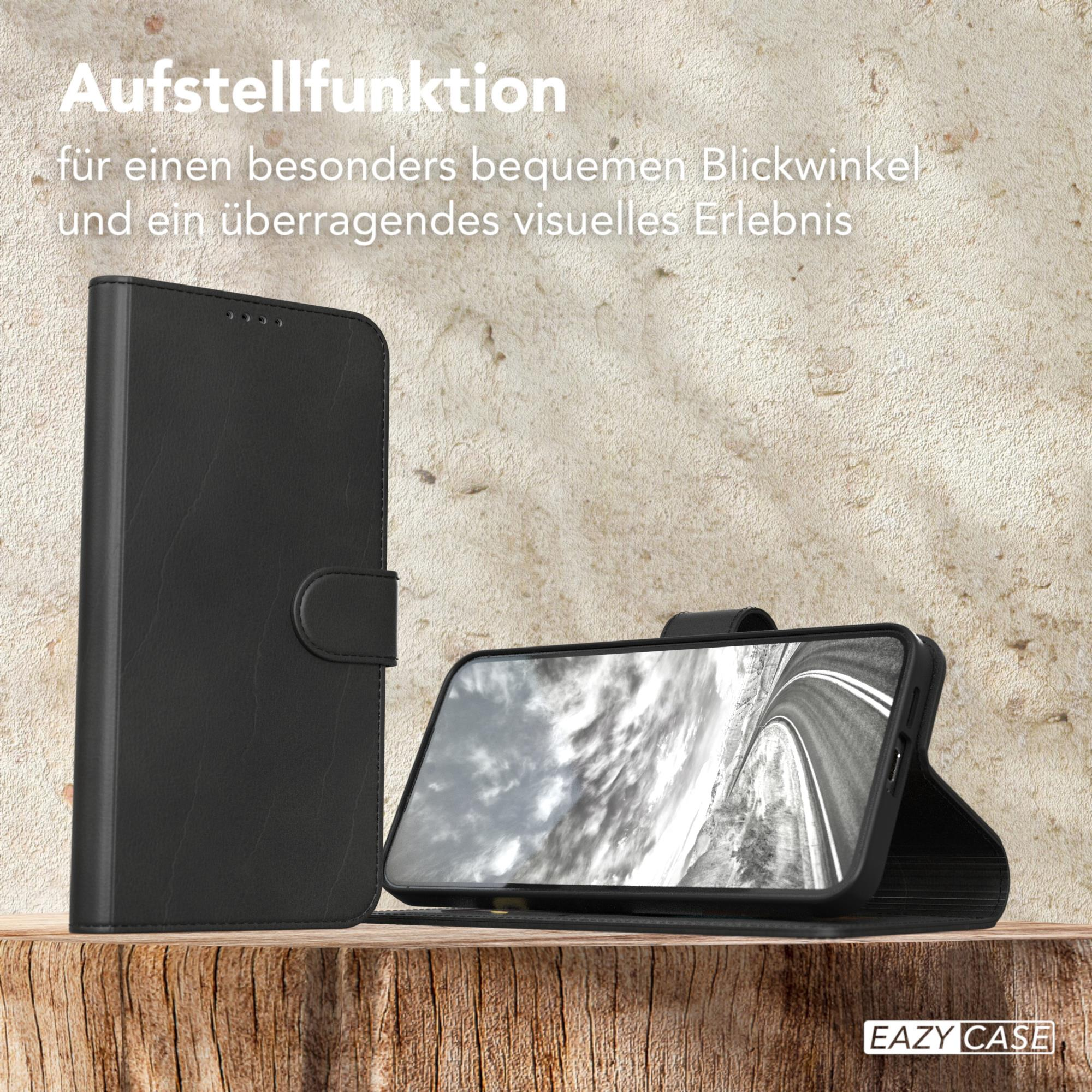 Schwarze Handyhülle mit einem Telefon darin, das aufrecht steht. Sie zeigt ihre Standfunktion.