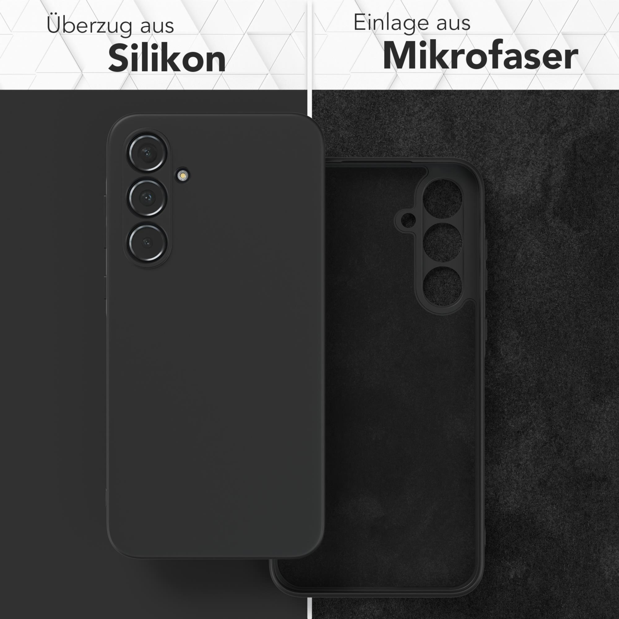 Schwarze Handyhülle, Innen- und Außenseite, auf dunklem Hintergrund.