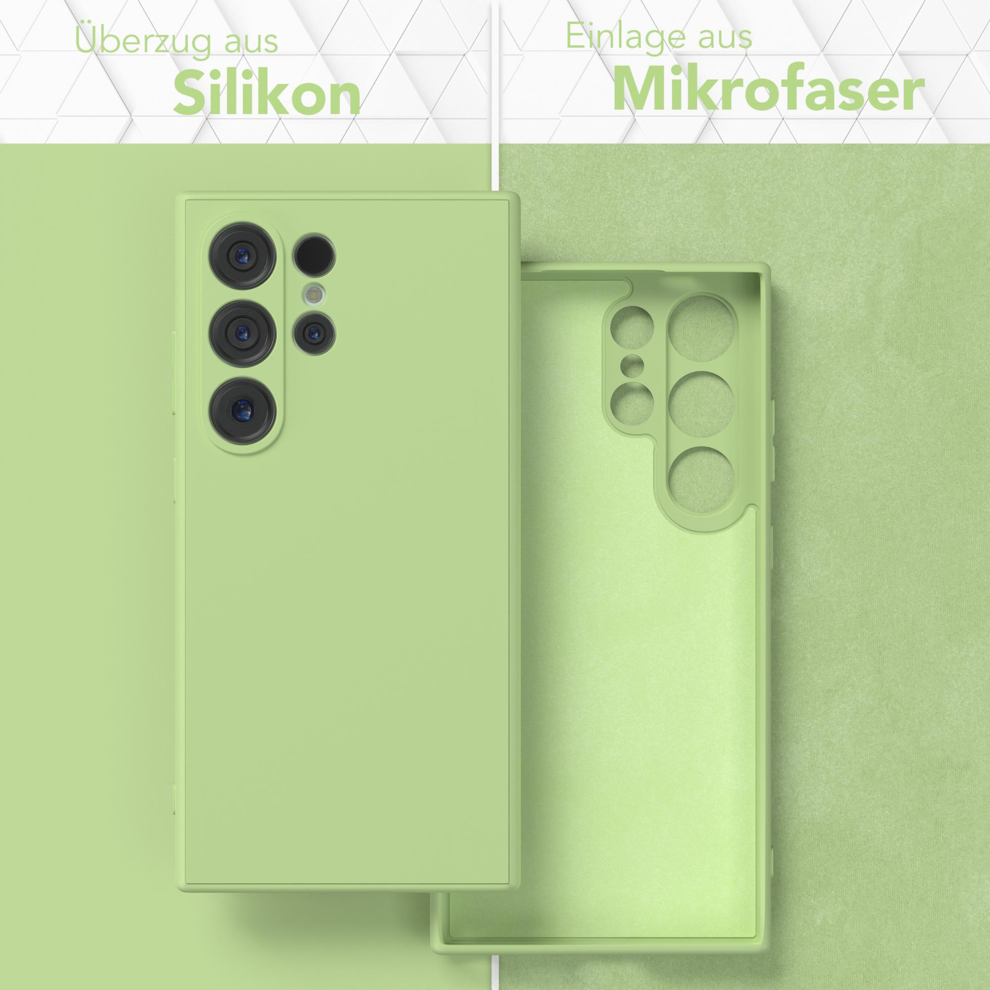 Eine Handyhülle, grün, mit Silikon außen und Mikrofaser innen.