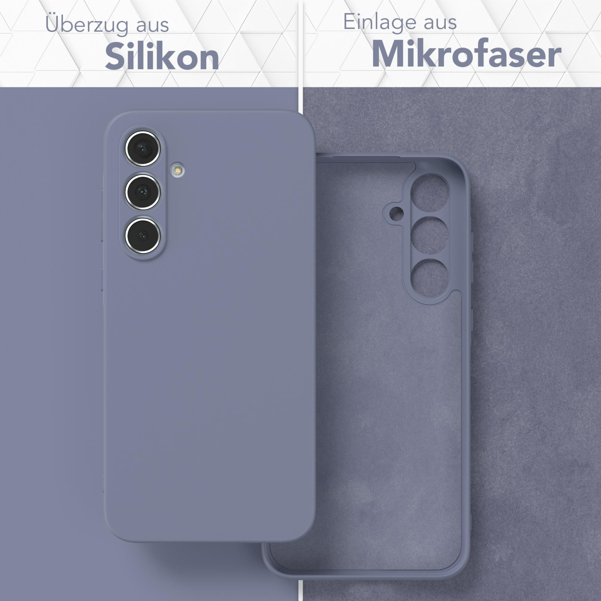 Blaue Handyhülle und ihr Mikrofaserfutter. Text: Überzug aus Silikon, Einlage aus Mikrofaser.