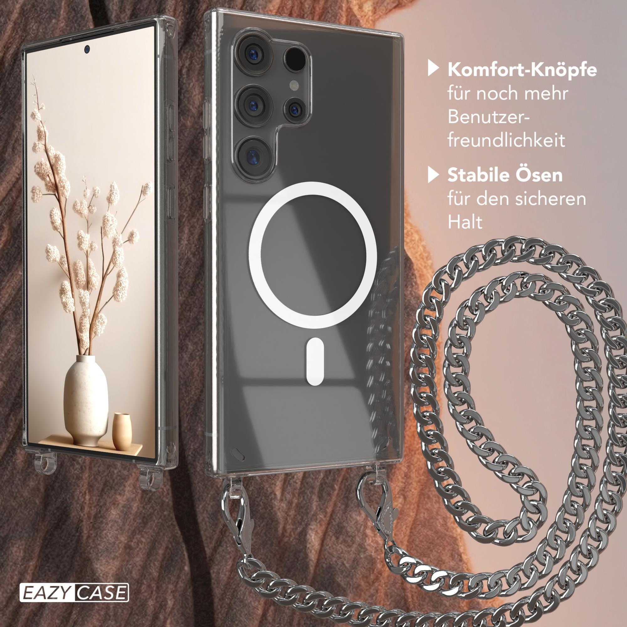 Transparente Handyhülle mit Silberkette. Telefon zeigt Vase mit Blumen.