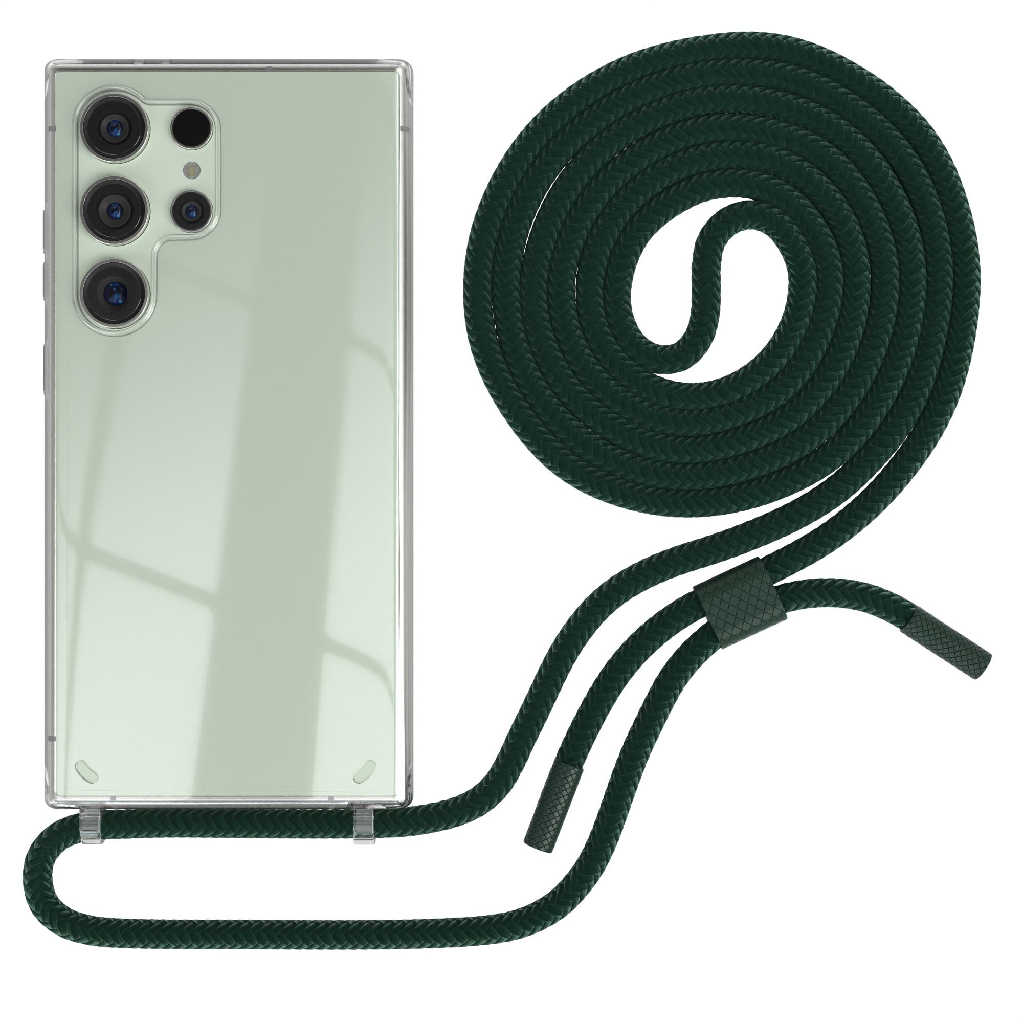 Grünes Smartphone mit transparenter Hülle und dunkelgrünem Seil. Weißer Hintergrund.