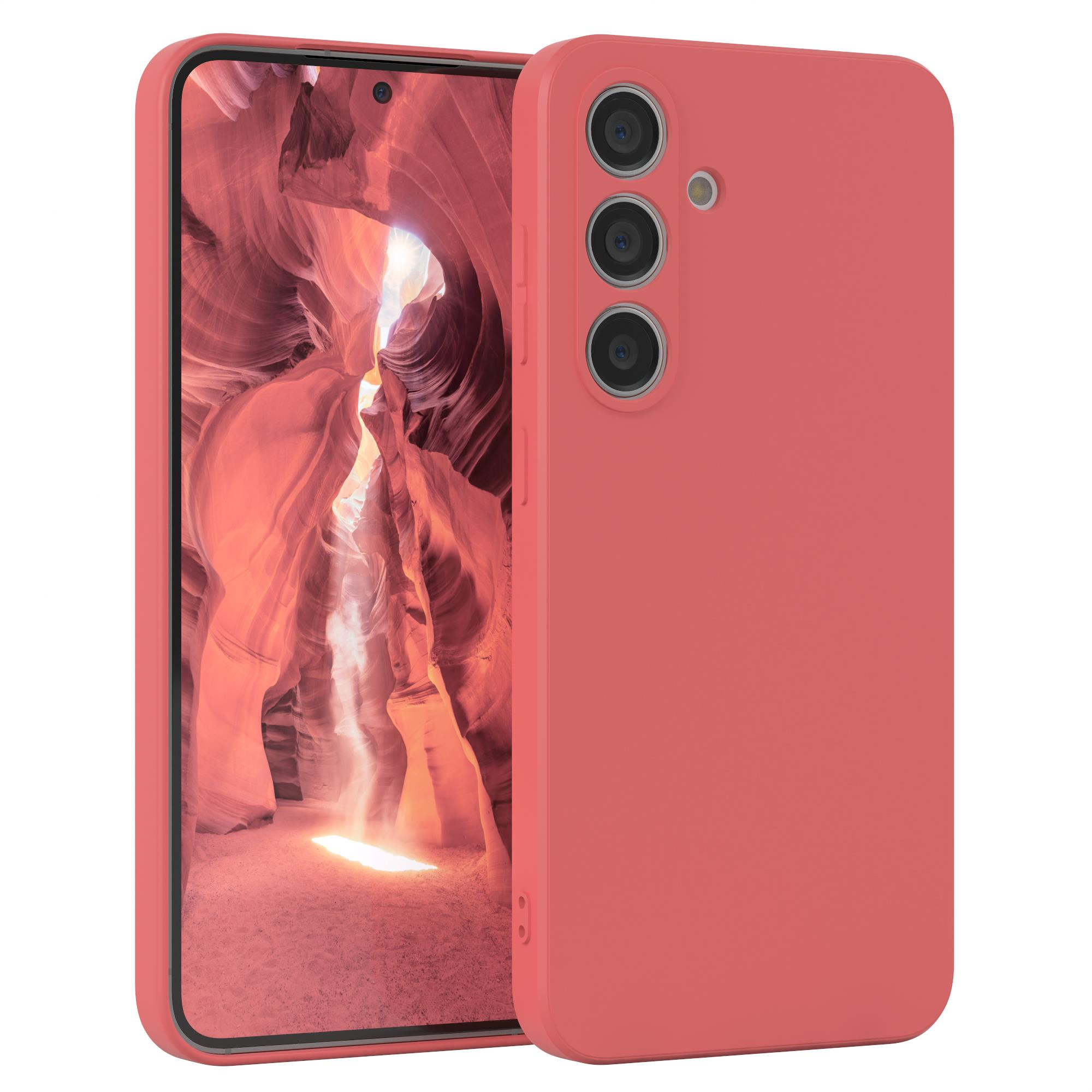 Eine rosa Handyhülle, die das Telefon bedeckt. Die Hülle ist einfarbig rosa und bedeckt das Telefon.