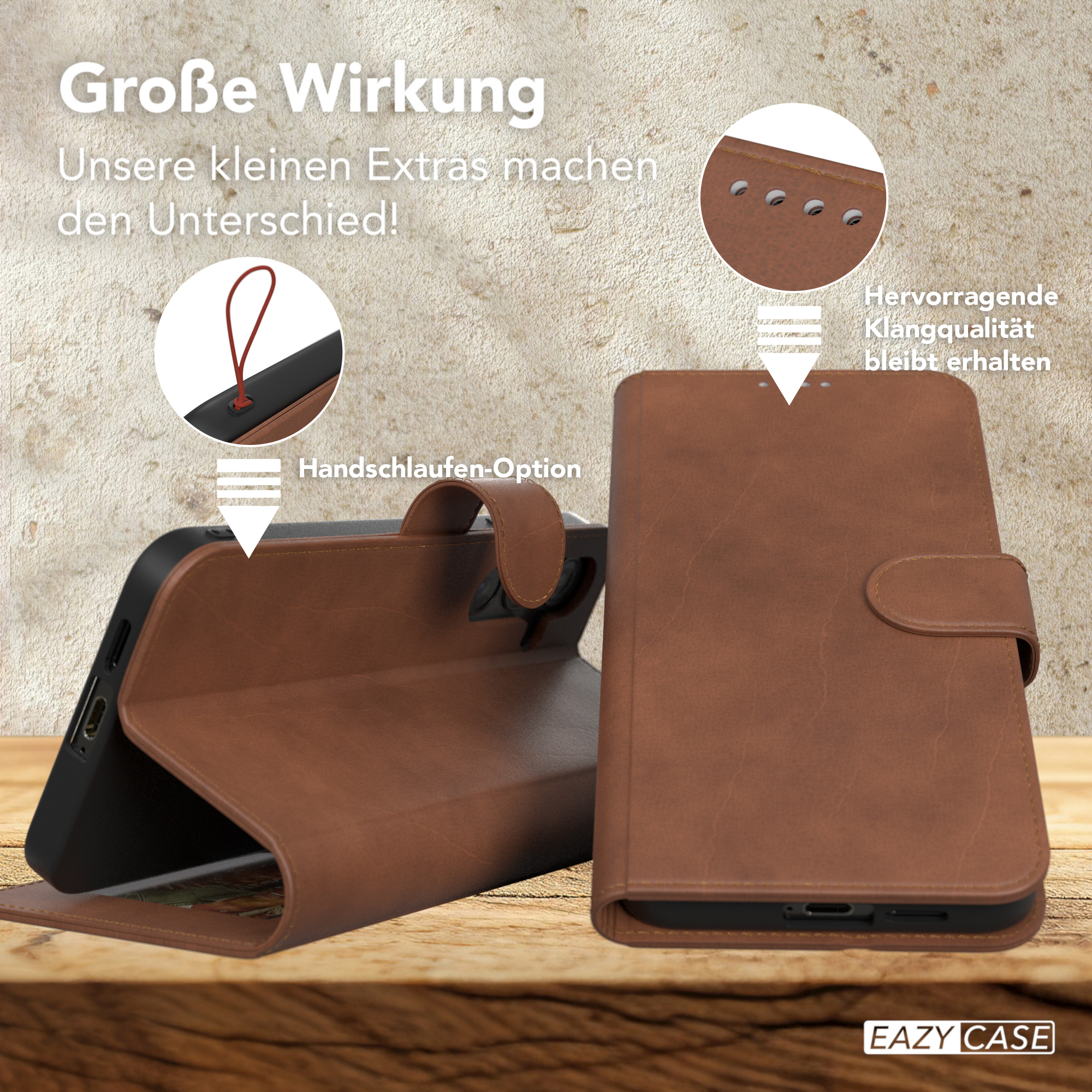 Eine braune Leder-Handyhülle ist geöffnet. Ein roter Riemen hängt von oben.