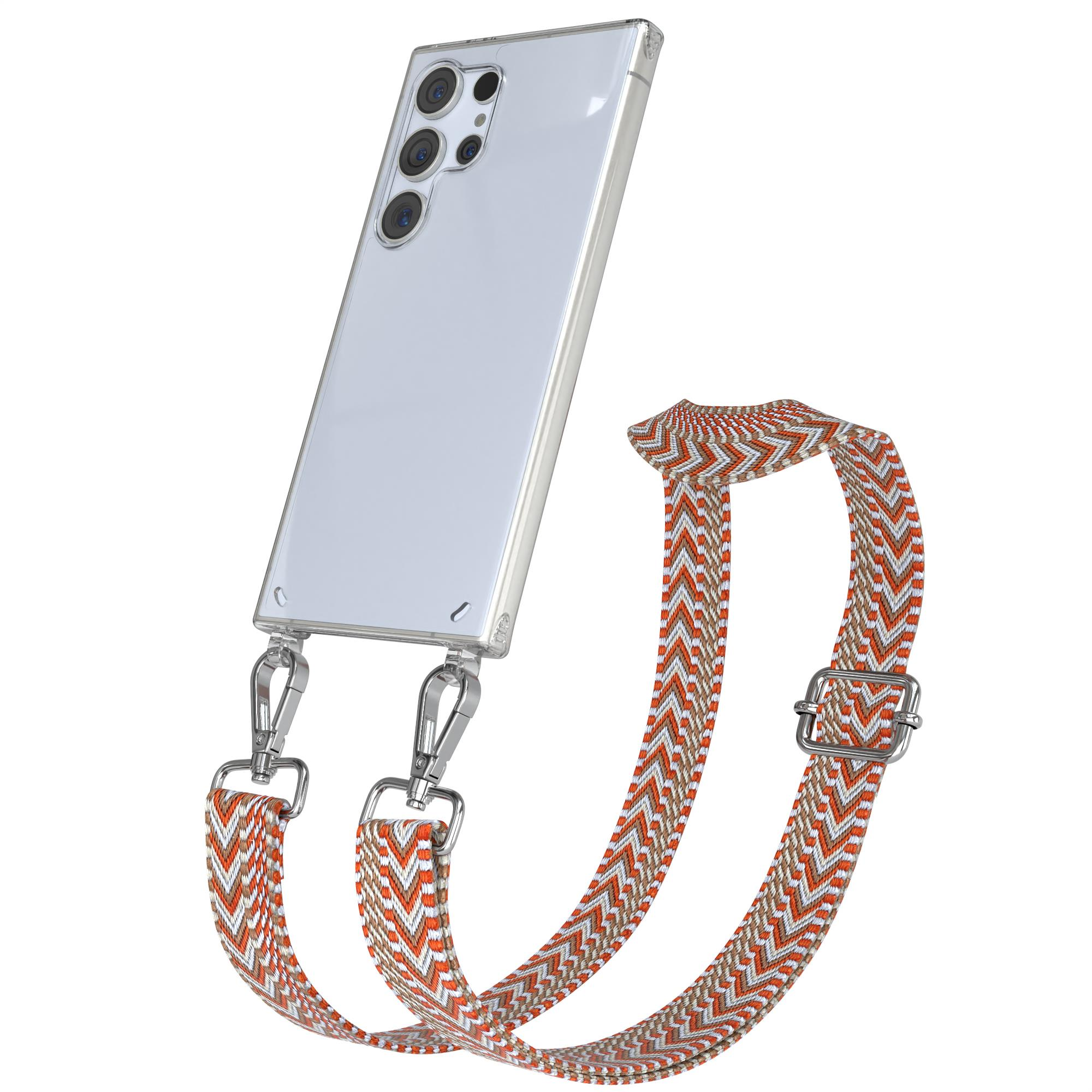 Ein silbernes Smartphone mit einem gemusterten orange-weißen Band auf weißem Hintergrund.