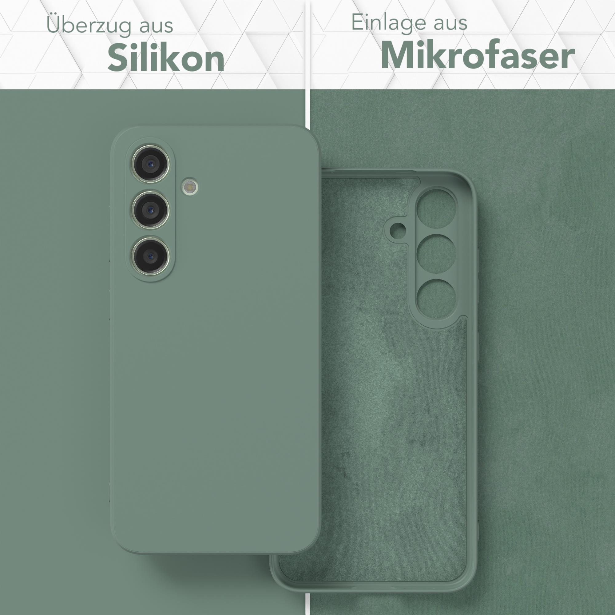 Grüne Handyhülle und Mikrofaser-Einsatz. Etiketten: Silikon und Mikrofaser. Der Hintergrund ist zweifarbig grün.