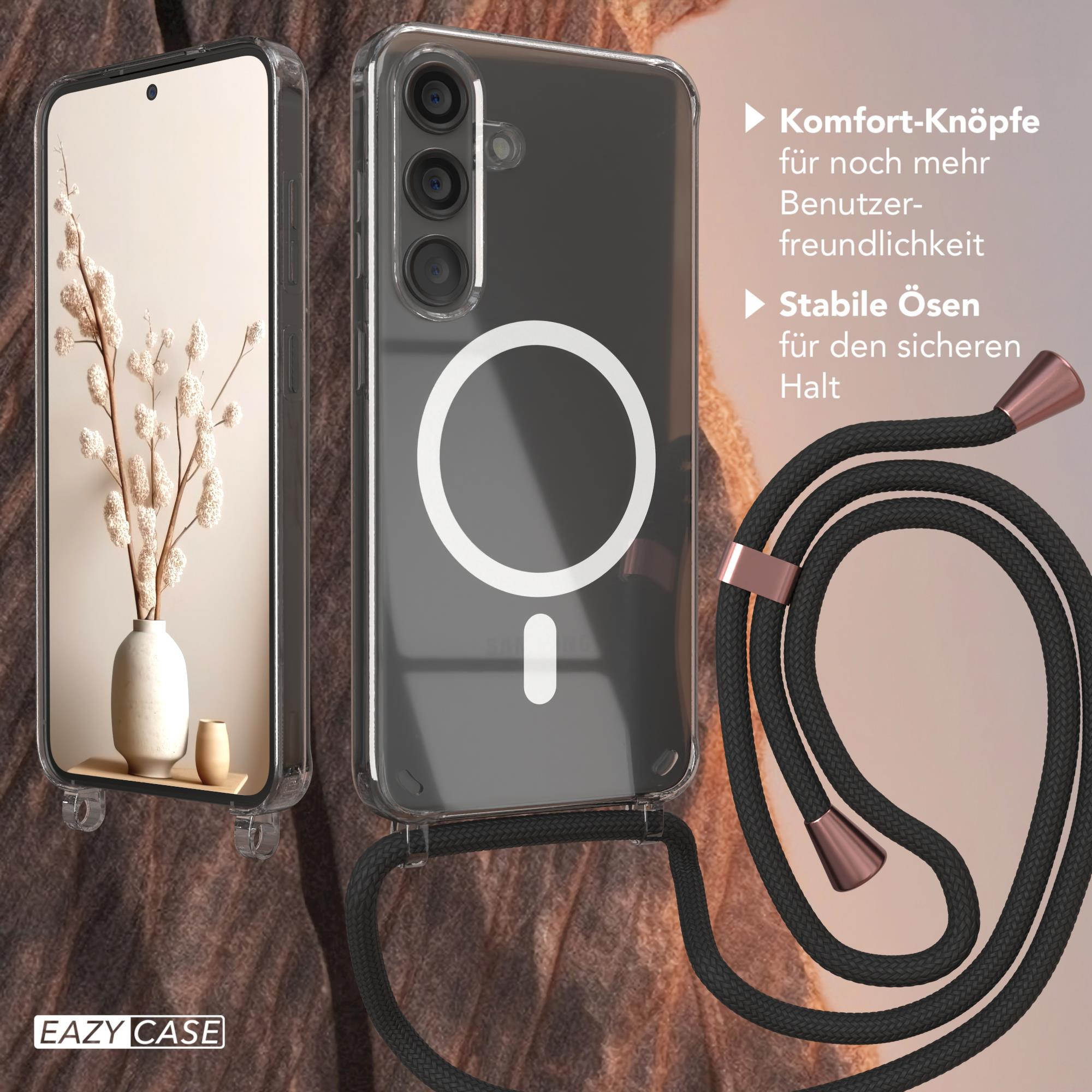 Handyhülle mit weißer Blume und Band. Transparente Hülle mit schwarzem Band, goldene Hardware. Text: Komfort-Tasten.