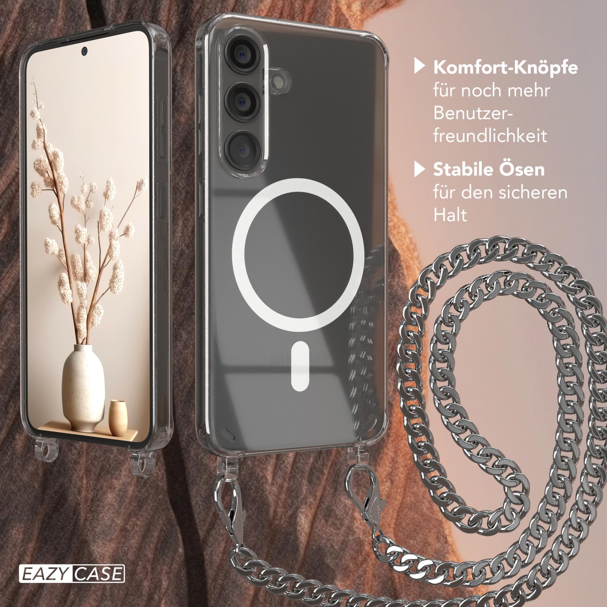 Handyhülle mit Kette und Vase mit Blumen links.